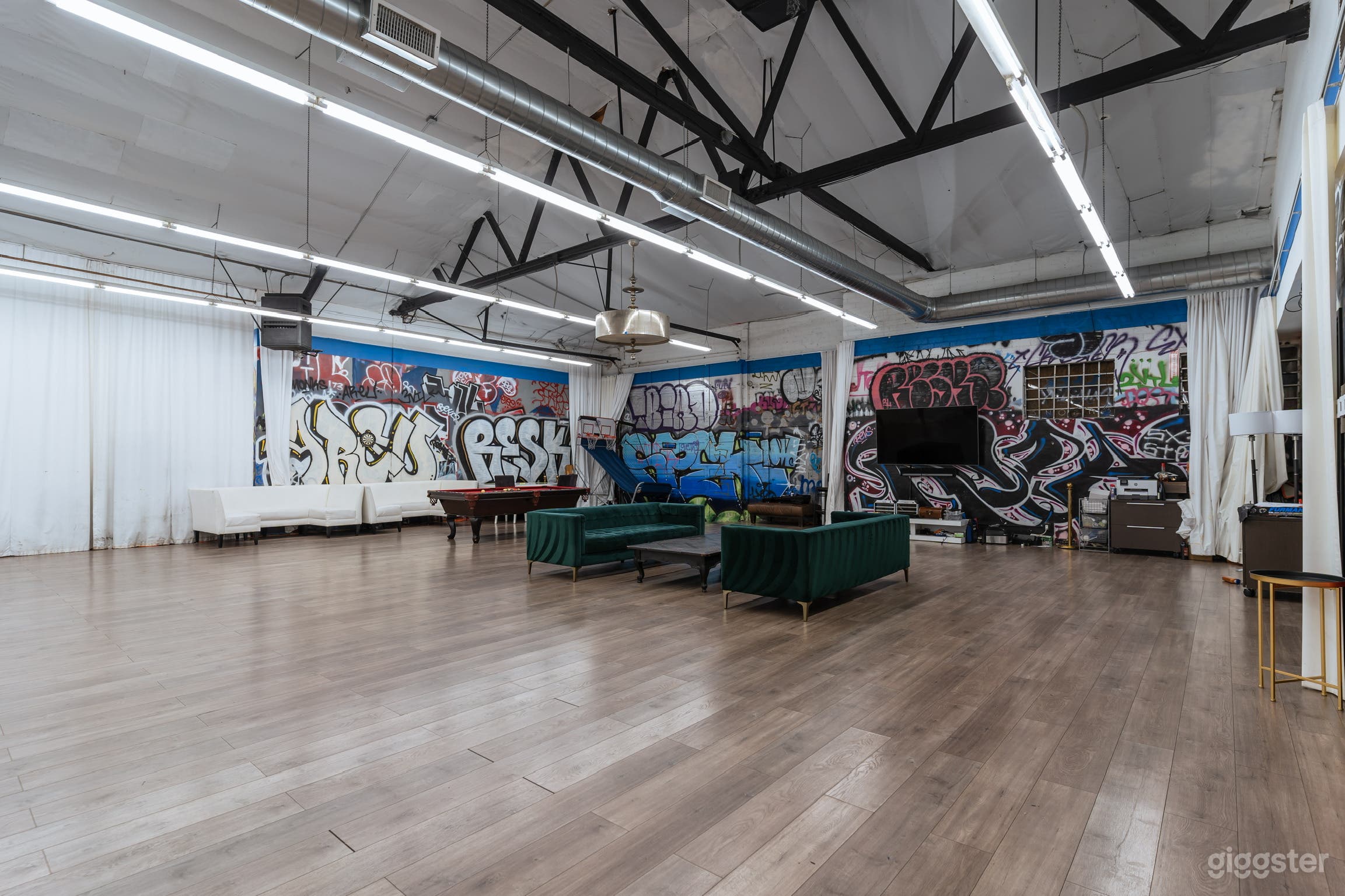 Industrial Event Space with New &amp; Vintage Cars Photo 2