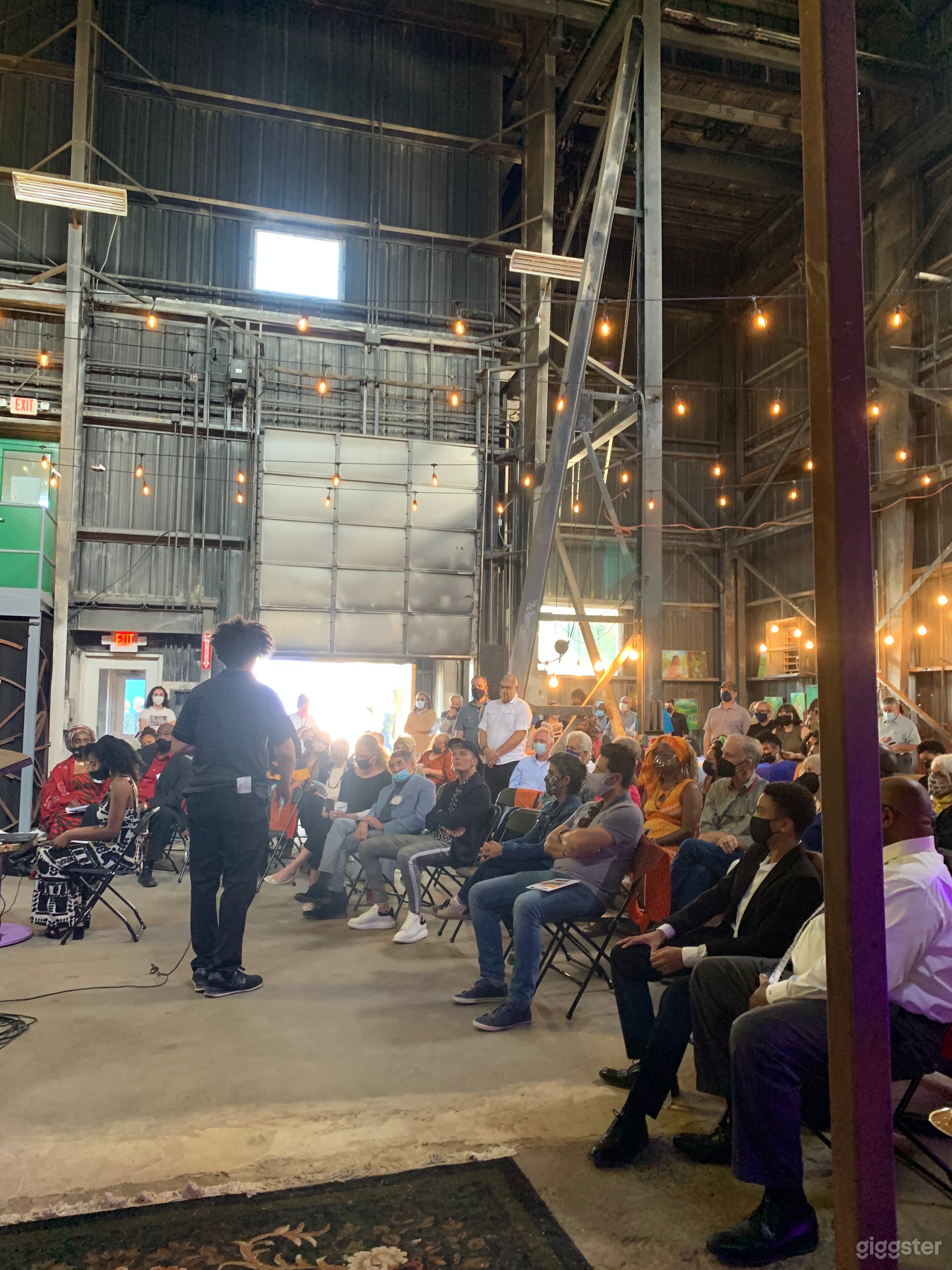 Building 2 is an old aluminum smelting plant turned into biodiesel plant turned into event space.  It is 4 stories high, open ceiling, 2 rollup doors with cement floors. Modular Stage and lighting included.
