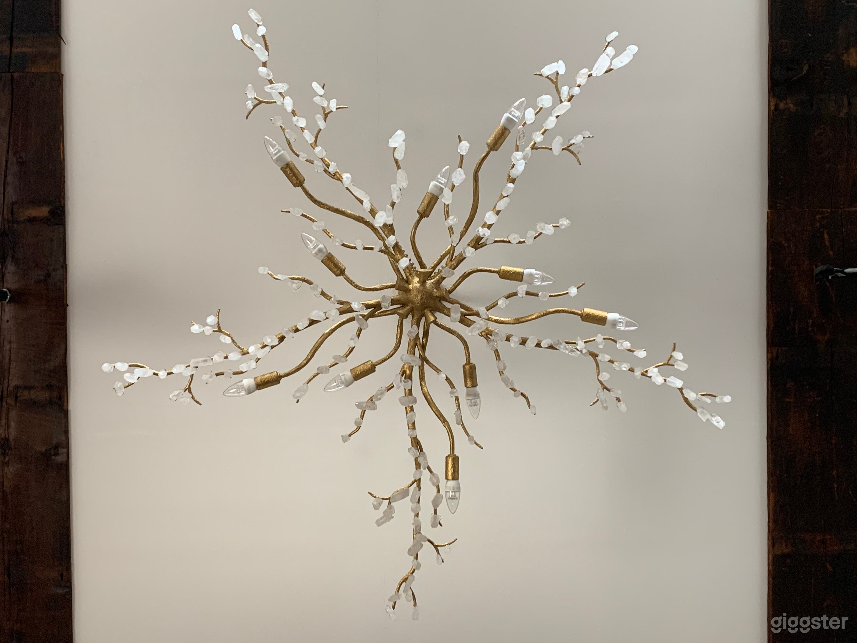 Chandelier in main studio space made with over 120 natural quartz crystals (dimmable)