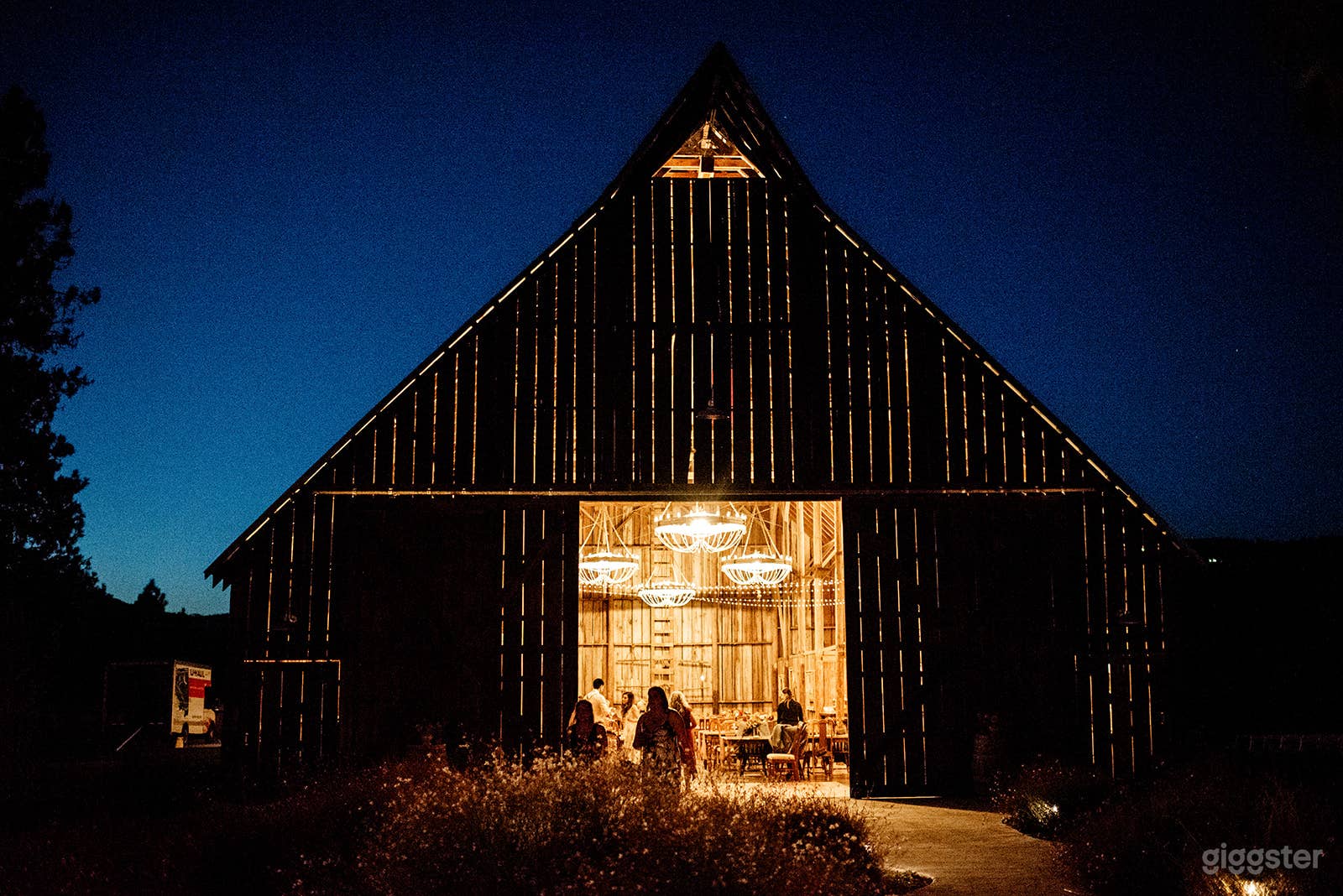 Barn and courtyard at night