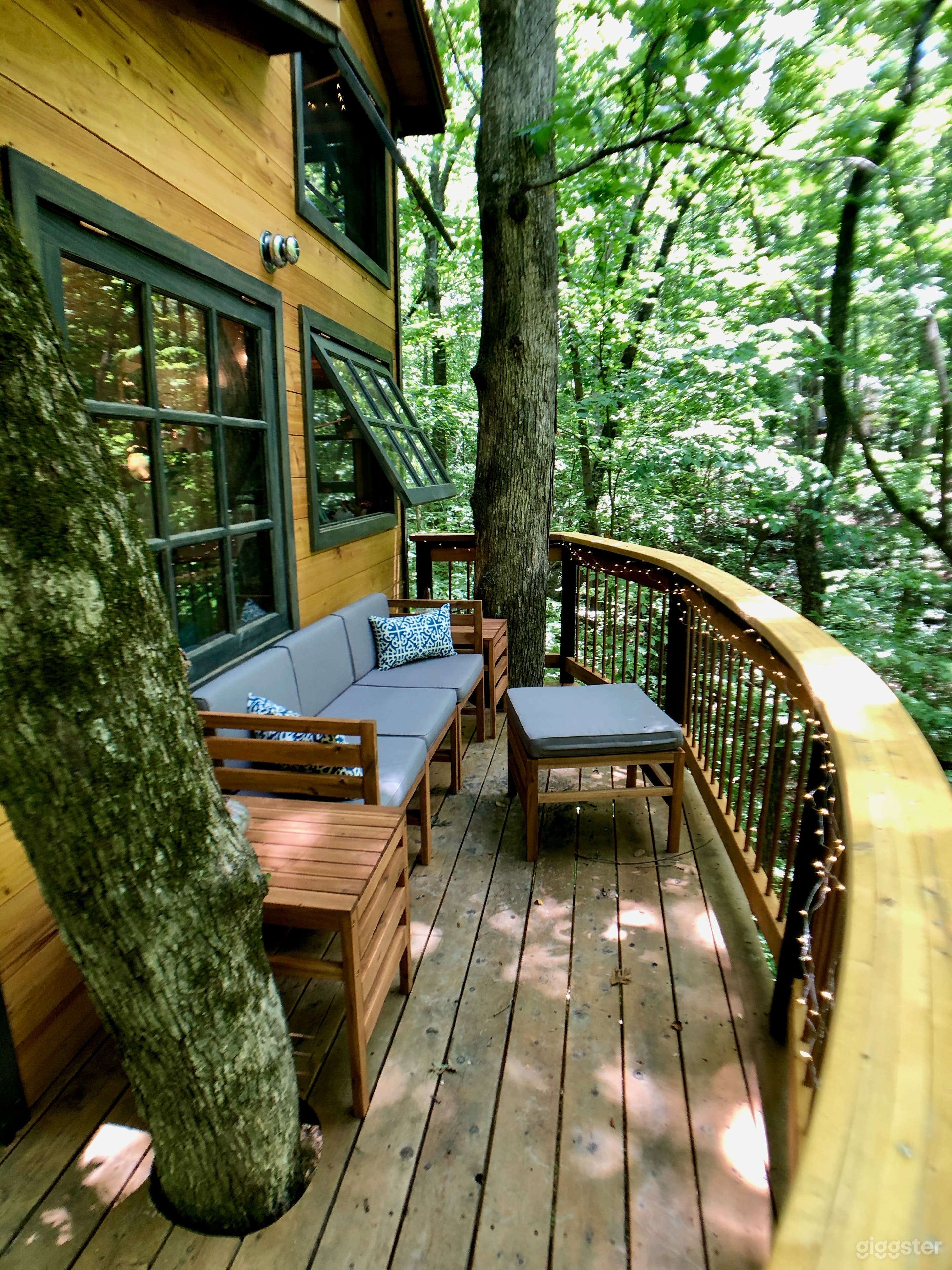 Cozy sitting area on deck, overlooking small stream 30 feet below.