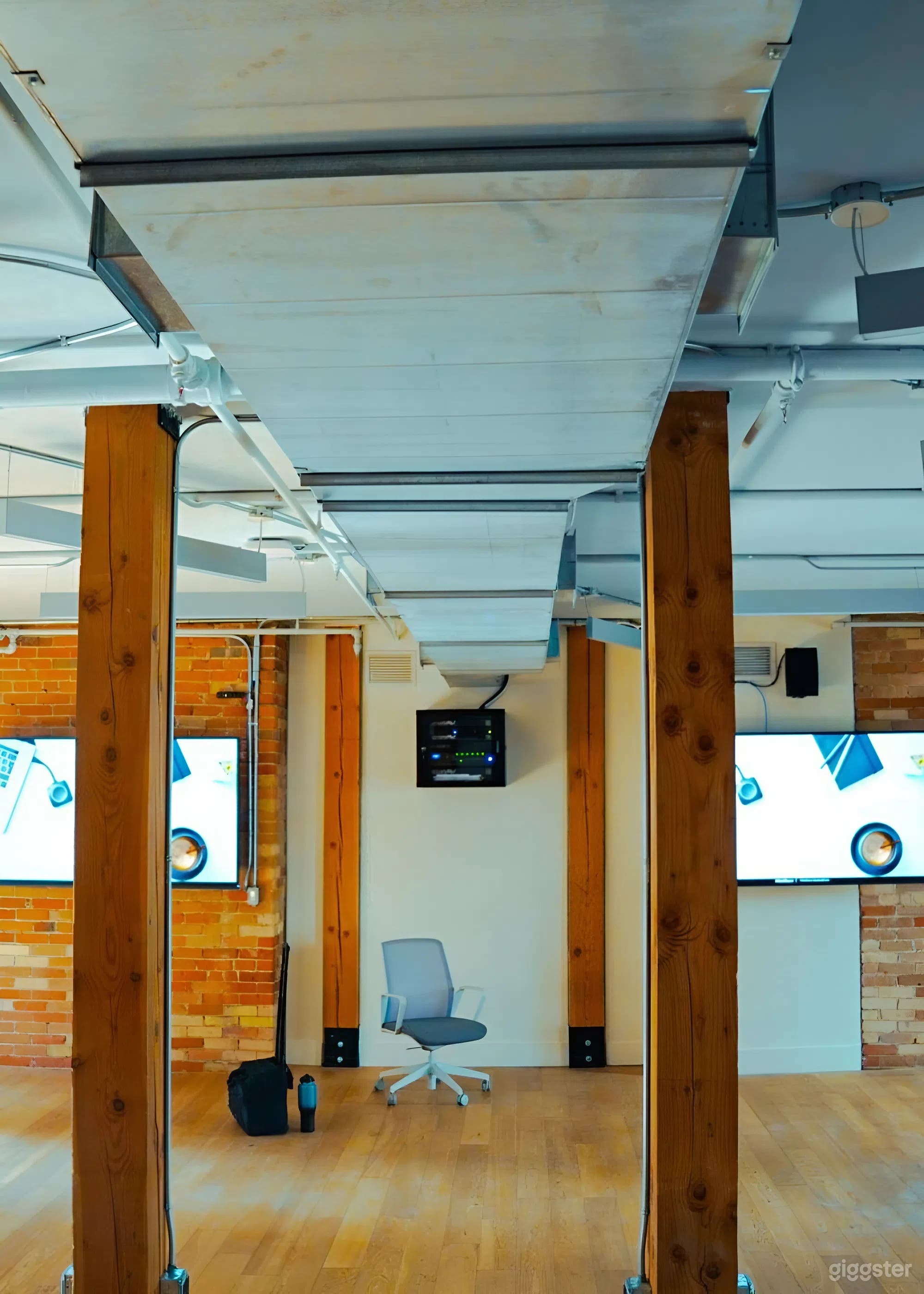 Charming Brick Event Space with Breakout Rooms &amp; Light Photo 2