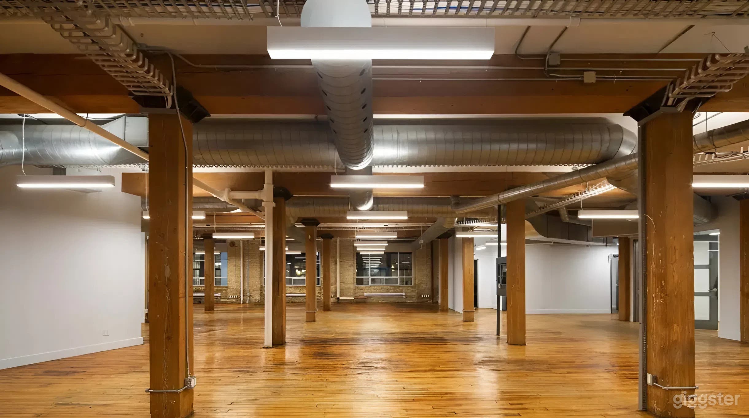 Charming Brick Event Space with Breakout Rooms &amp; Light Photo 3