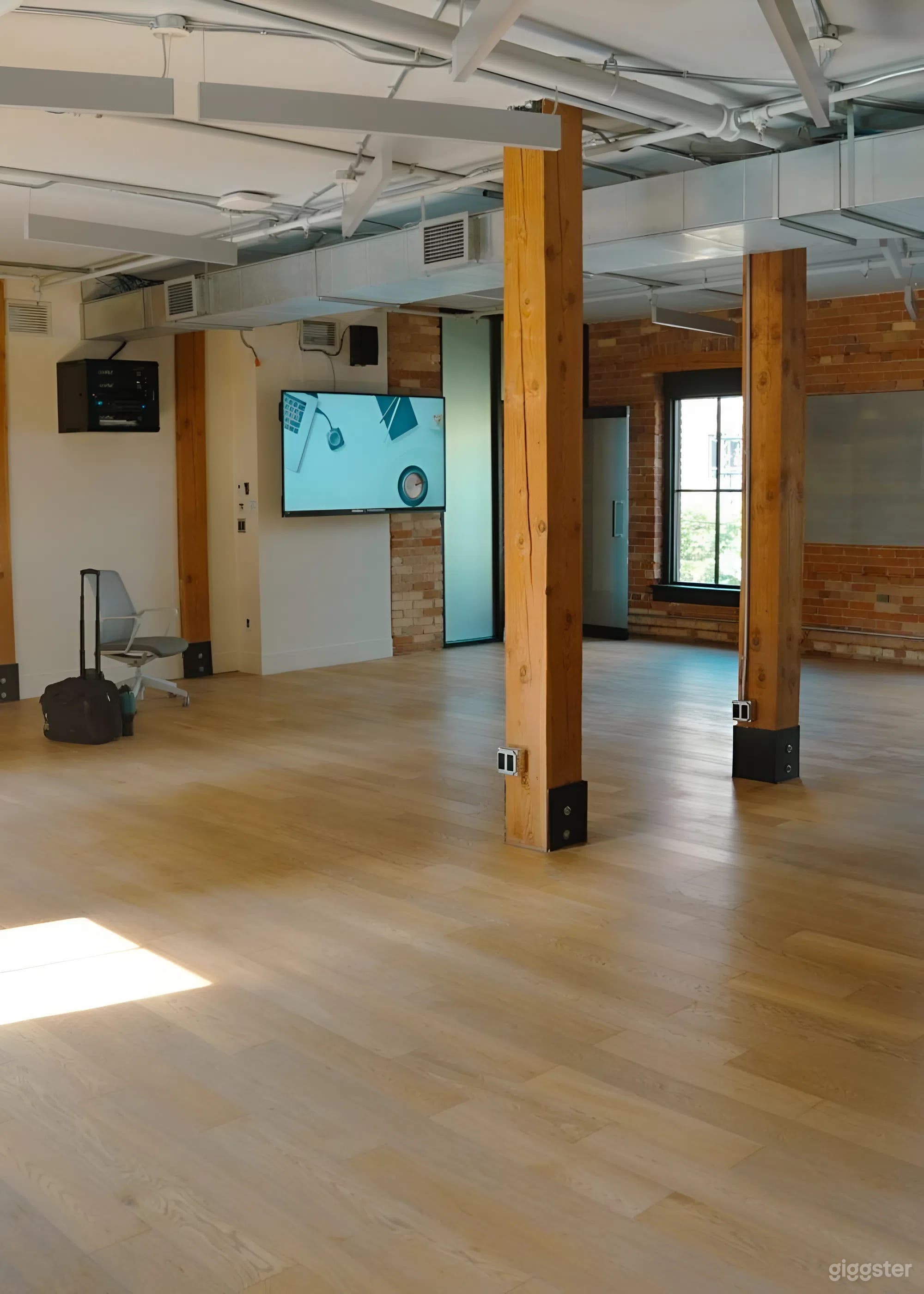 Charming Brick Event Space with Breakout Rooms &amp; Light Photo 1