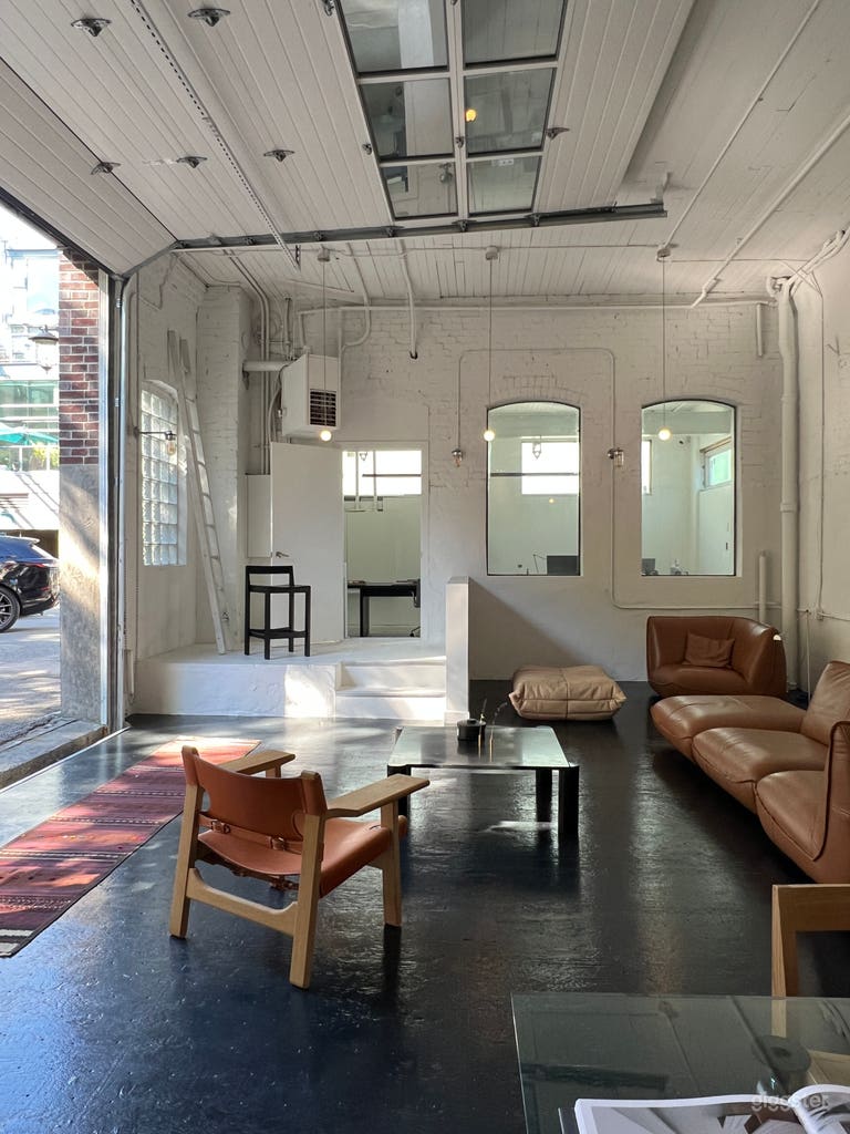  Kitchenette room is up two steps within the arched windows 