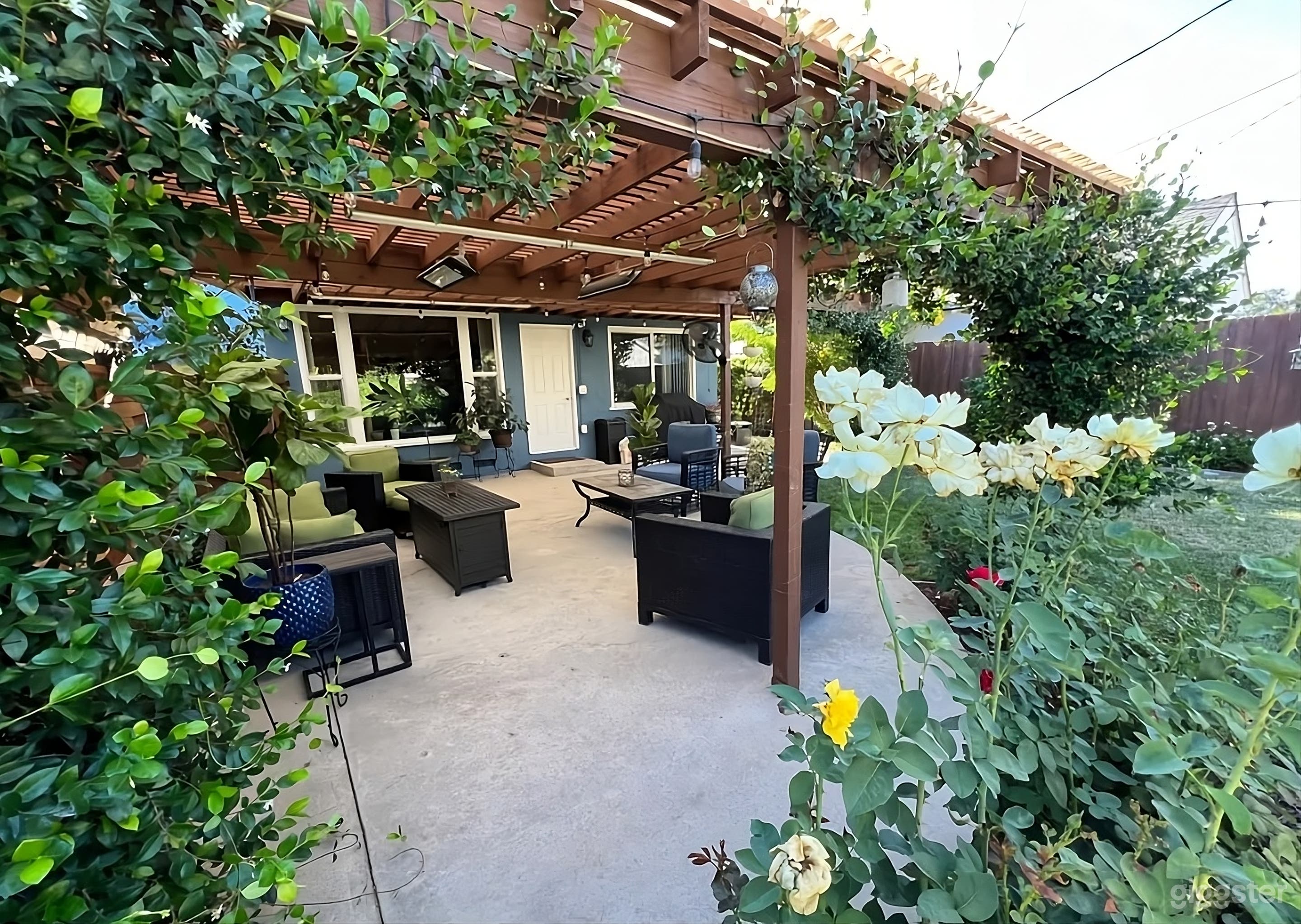 Enchanting Landscaped Backyard Photo 3