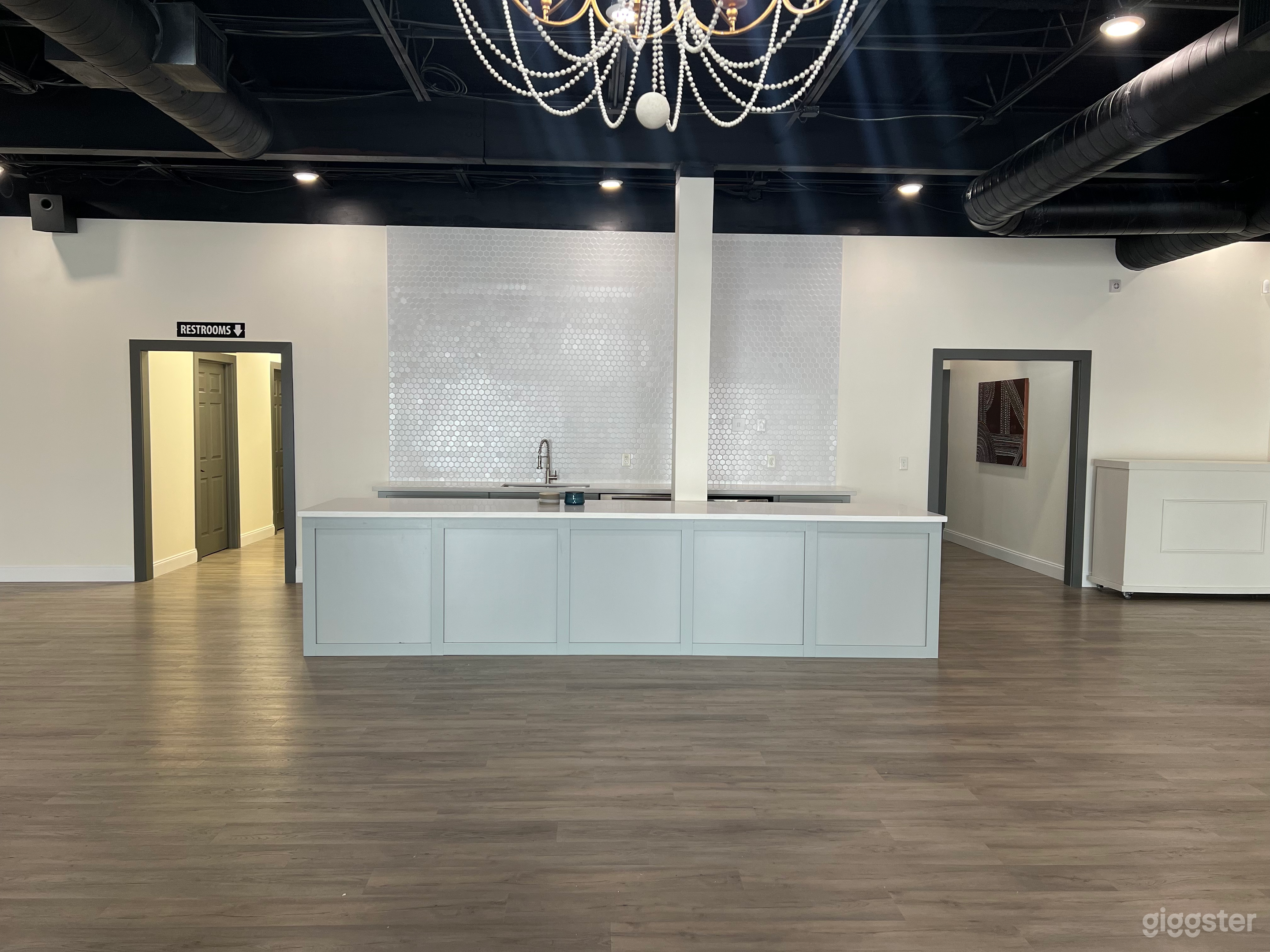 Chef quality prep kitchen with quartz countertops and tiled backsplash