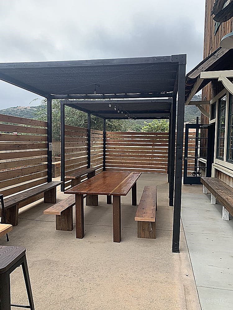 Sun-lit Patio with Party Benches Photo 2