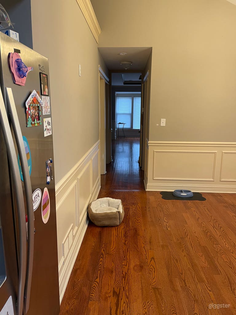  Hall from open kitchen/dining area to living room. 