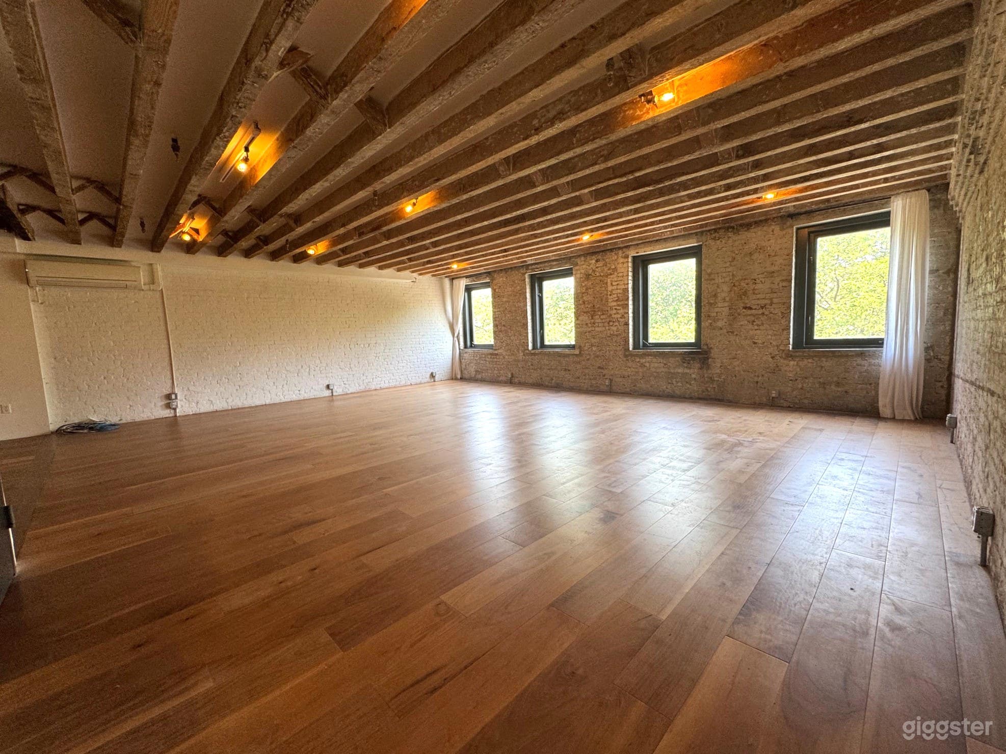 Convenient Exposed Brick Studio with Park Views Photo 3