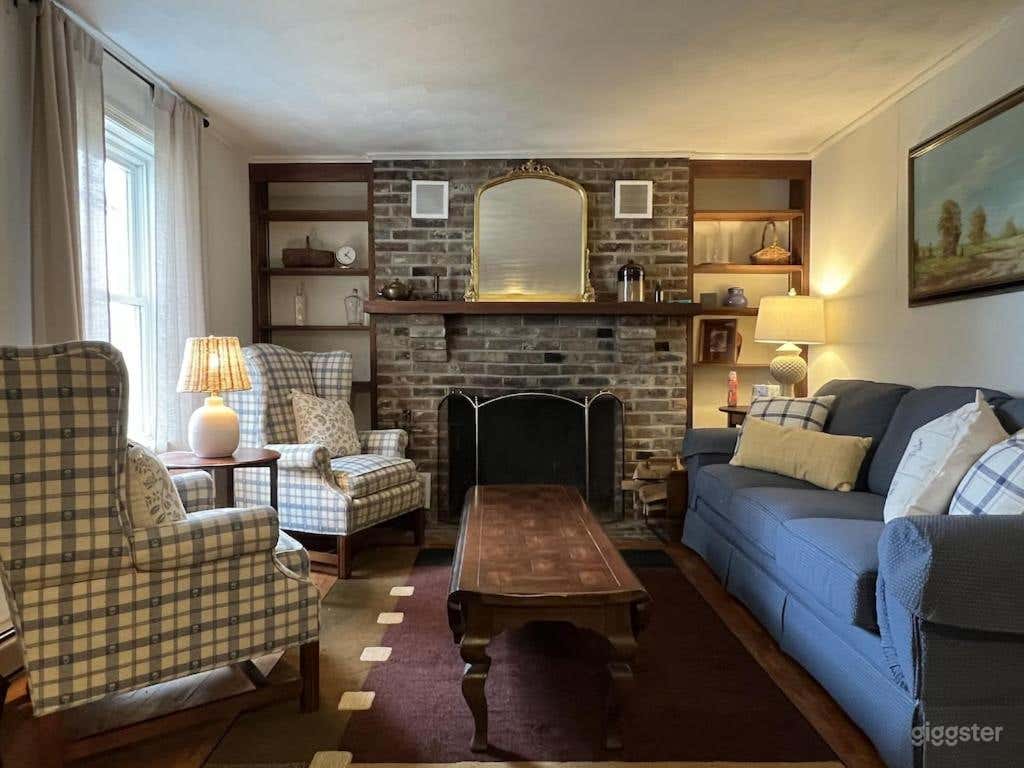 First floor living room with Smart TV and cozy fireplace