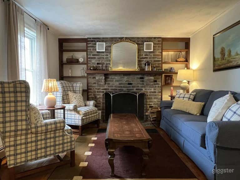  First floor living room with Smart TV and cozy fireplace 