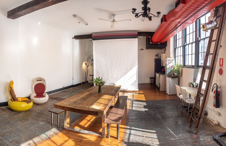  New York-style loft warehouse with white walls and rough timber floors

Two sets of barn doors for natural airflow

130 square metre’s of space with plenty of natural light

Beautiful tables that lock together in different layouts for corporate meetings 
