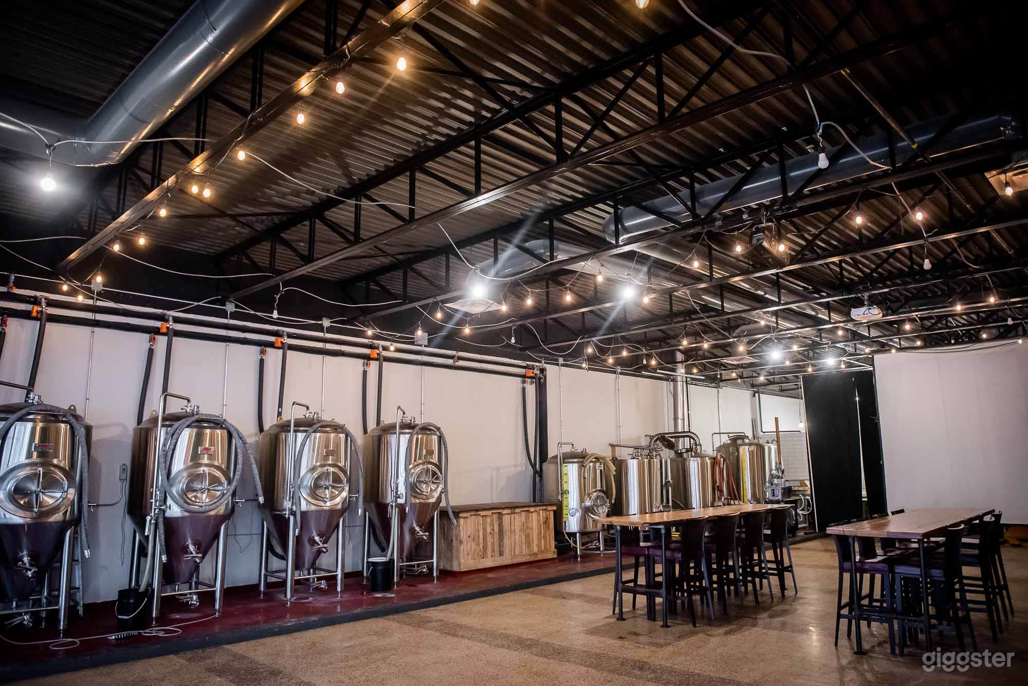 Modern Brewery Space with Exposed Brewing Vessels Photo 3