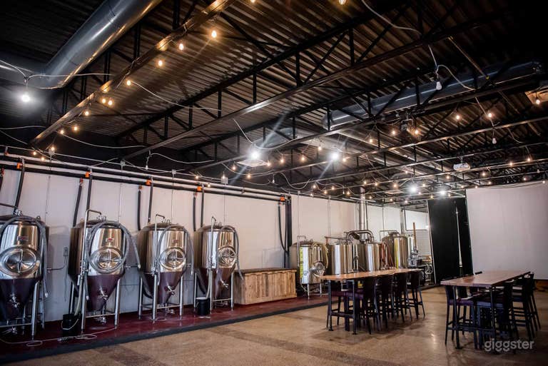  Modern Brewery Space with Exposed Brewing Vessels 