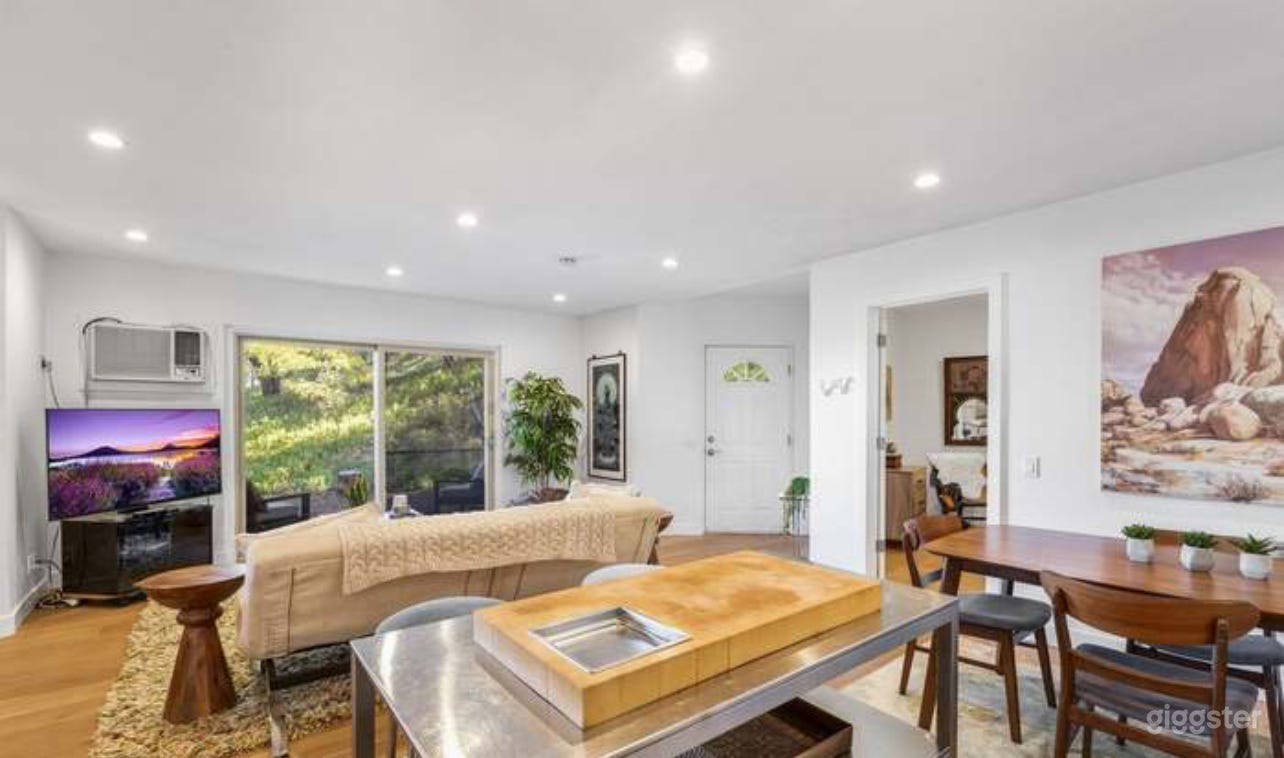 Kitchen through Living Room to outside view