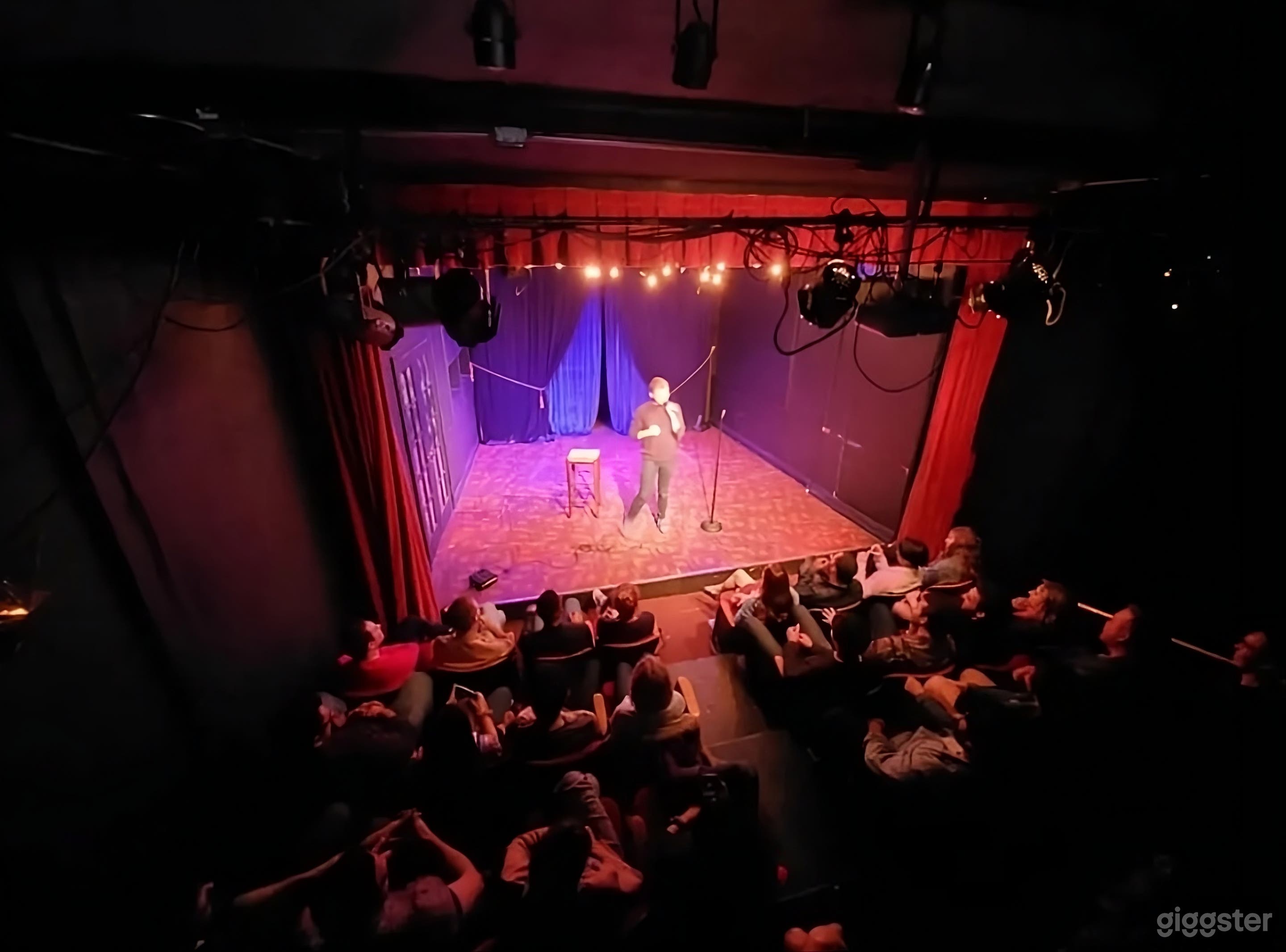 Intimate Red Seat Theater with Red Curtains Photo 3