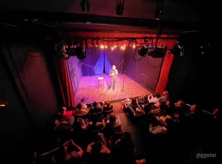  Intimate Red Seat Theater with Red Curtains 