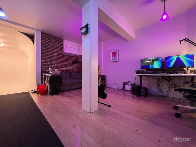  Lounge area with a genuine brick wall and workstation. 