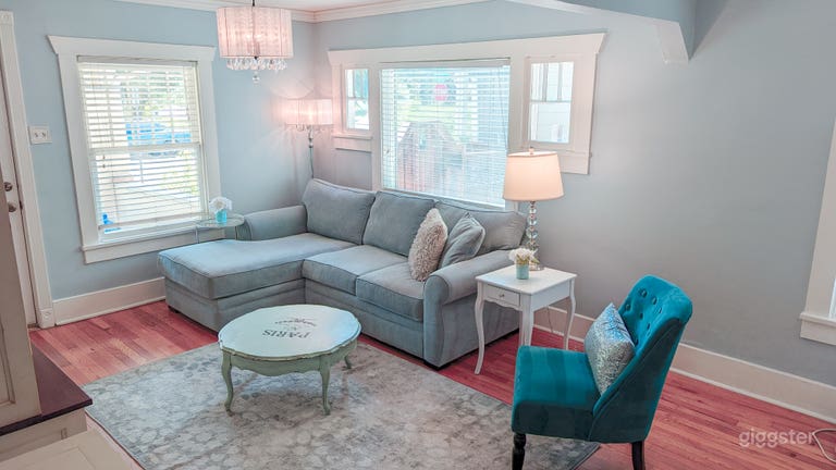  Living area with mixture of French pieces and chic textures 