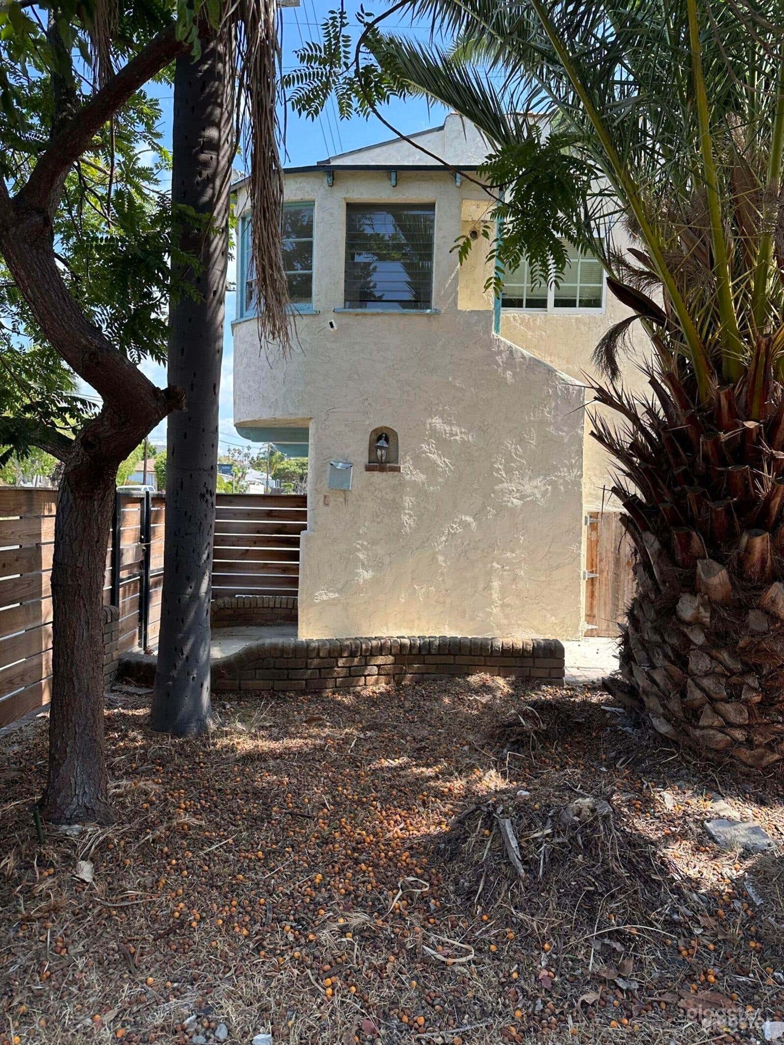 1920s Spanish-Style Fixer – Film-Ready Backyard Photo 3