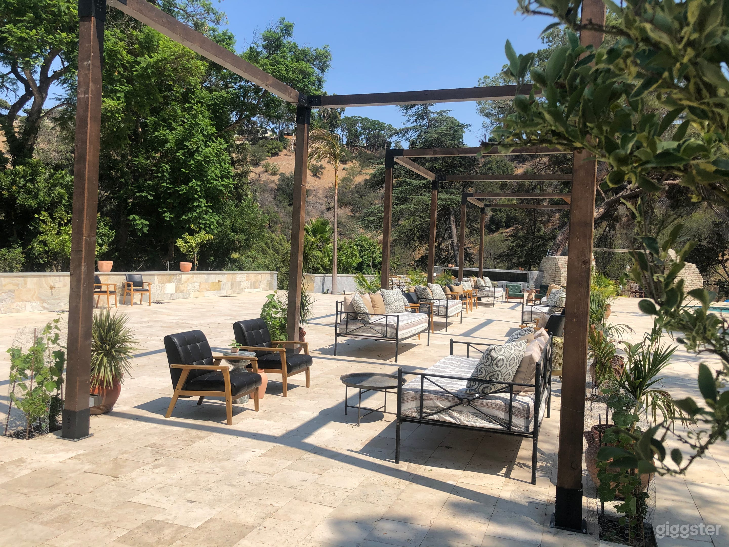 Three 12' x 12' pergolas with high ceilings. Ample lounge seating