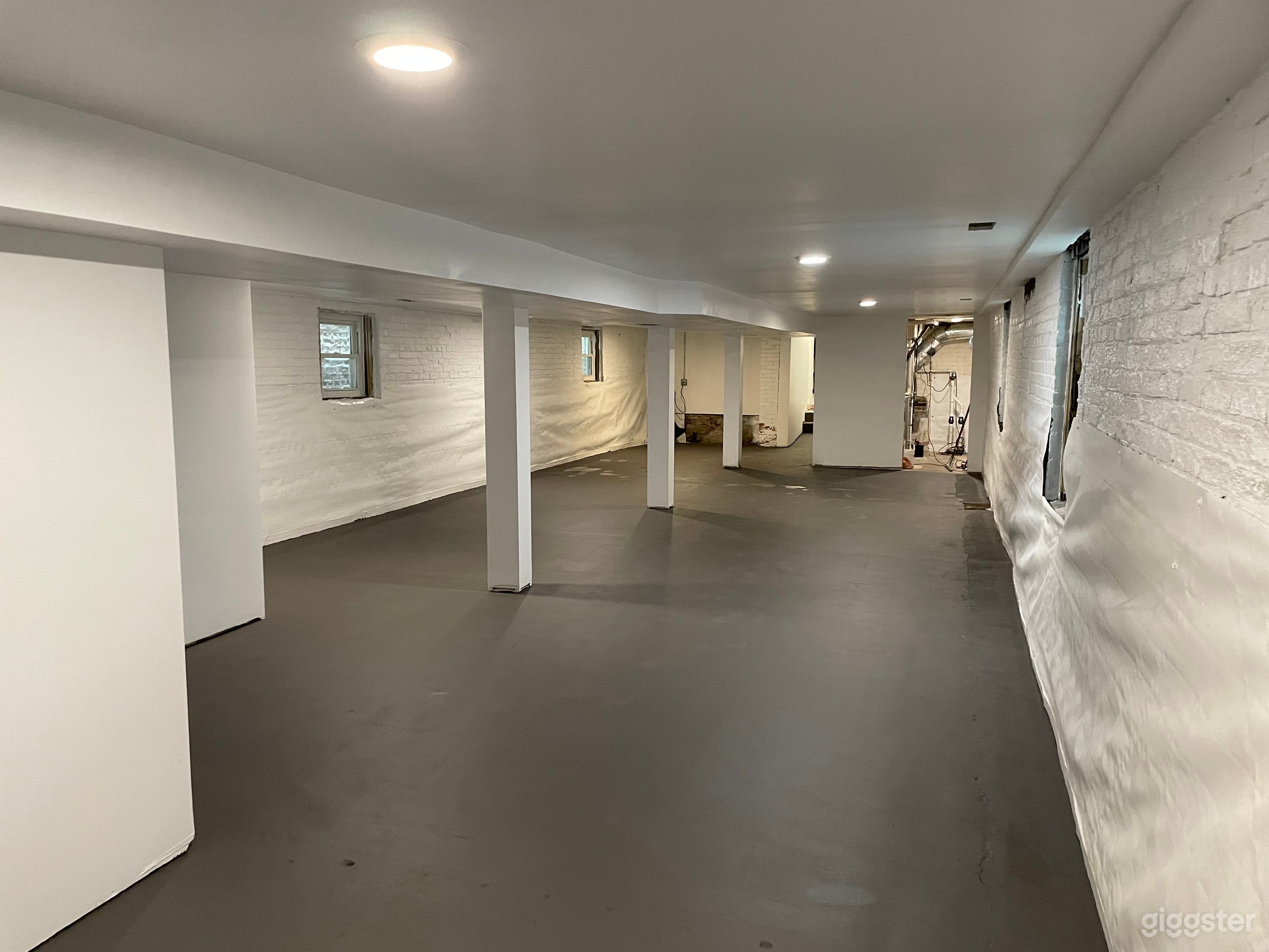 Basement currently has some shelves and storage in place