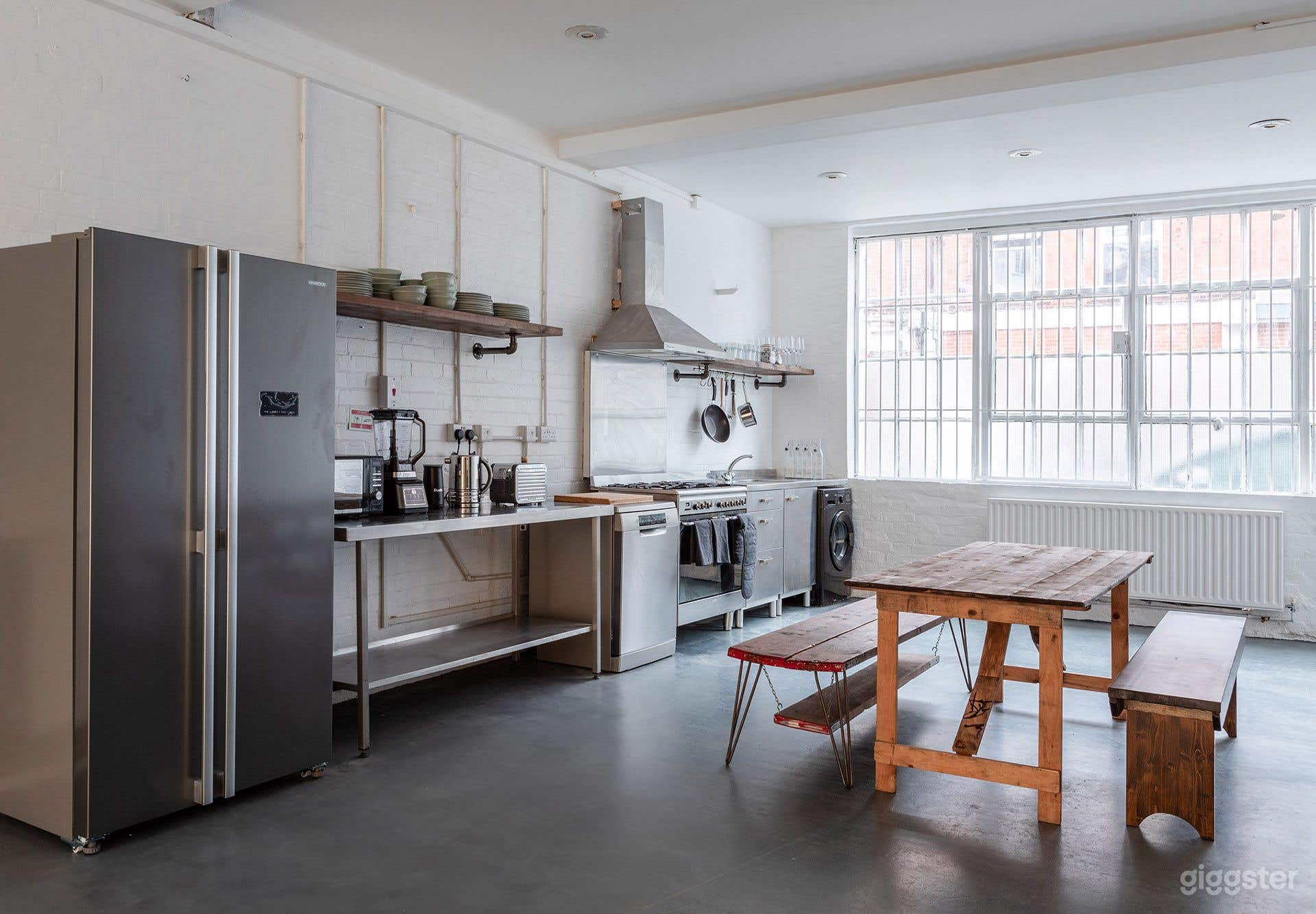 Bright White-Brick Warehouse Studio with Industrial Kitchen &amp; Backdrops Photo 3