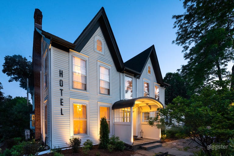  Exterior view of the Victorian Boutique Hotel at night 