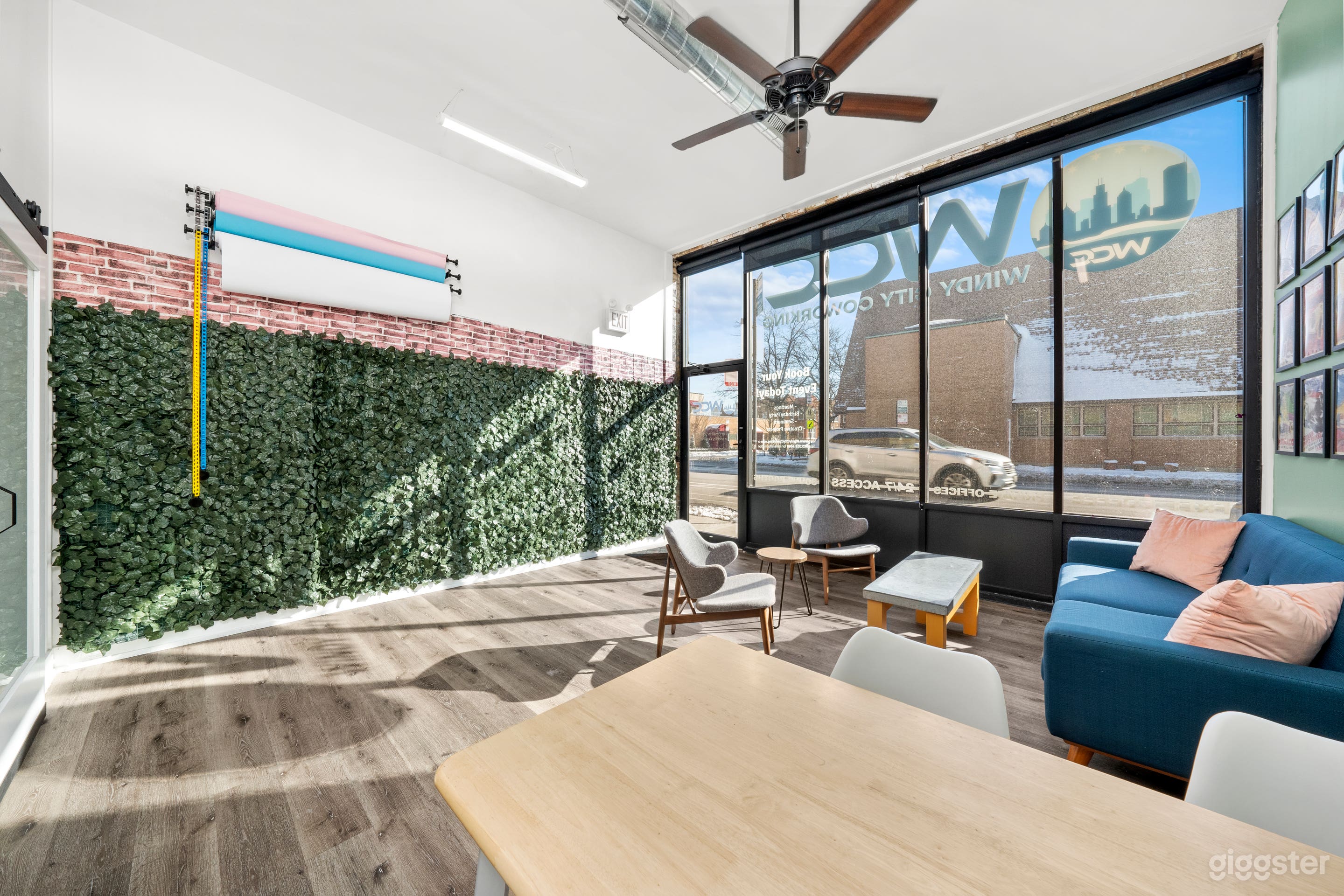 Front room featuring three color photo backdrop