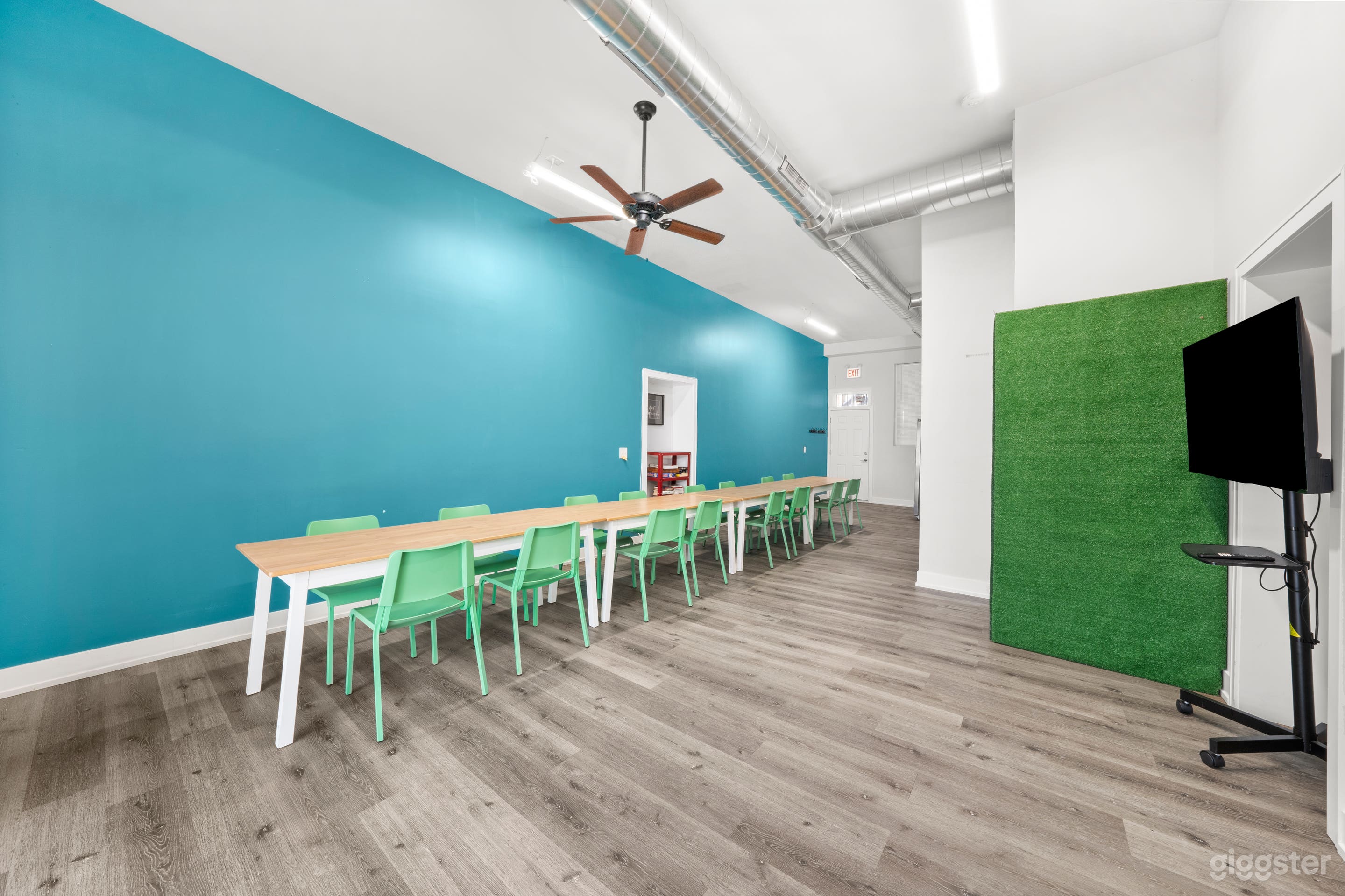 Large back room with 4 tables