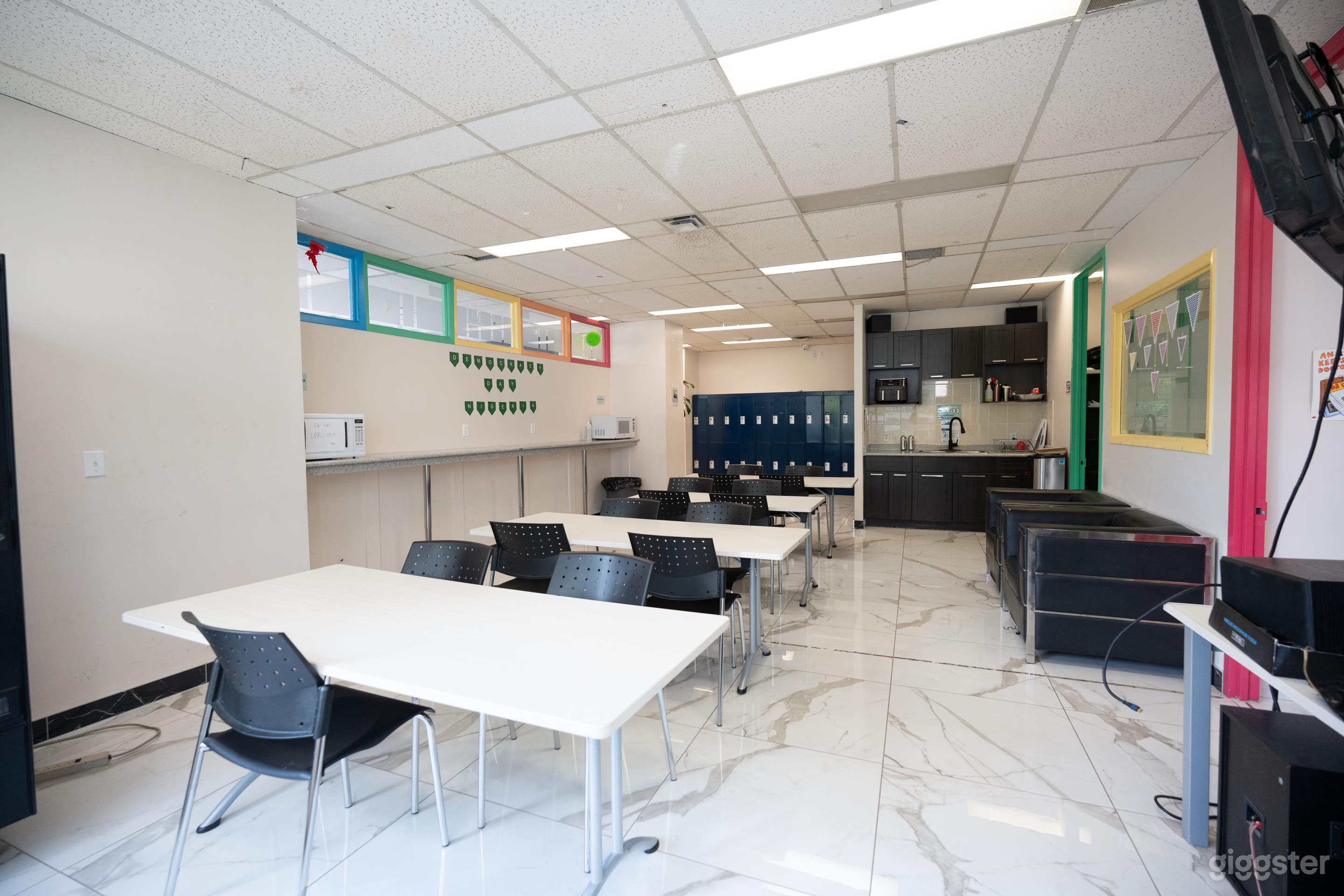 Cafeteria: microwave, hot &amp; cold water dispenser, kettle, sink, smart TV, tables &amp; chairs