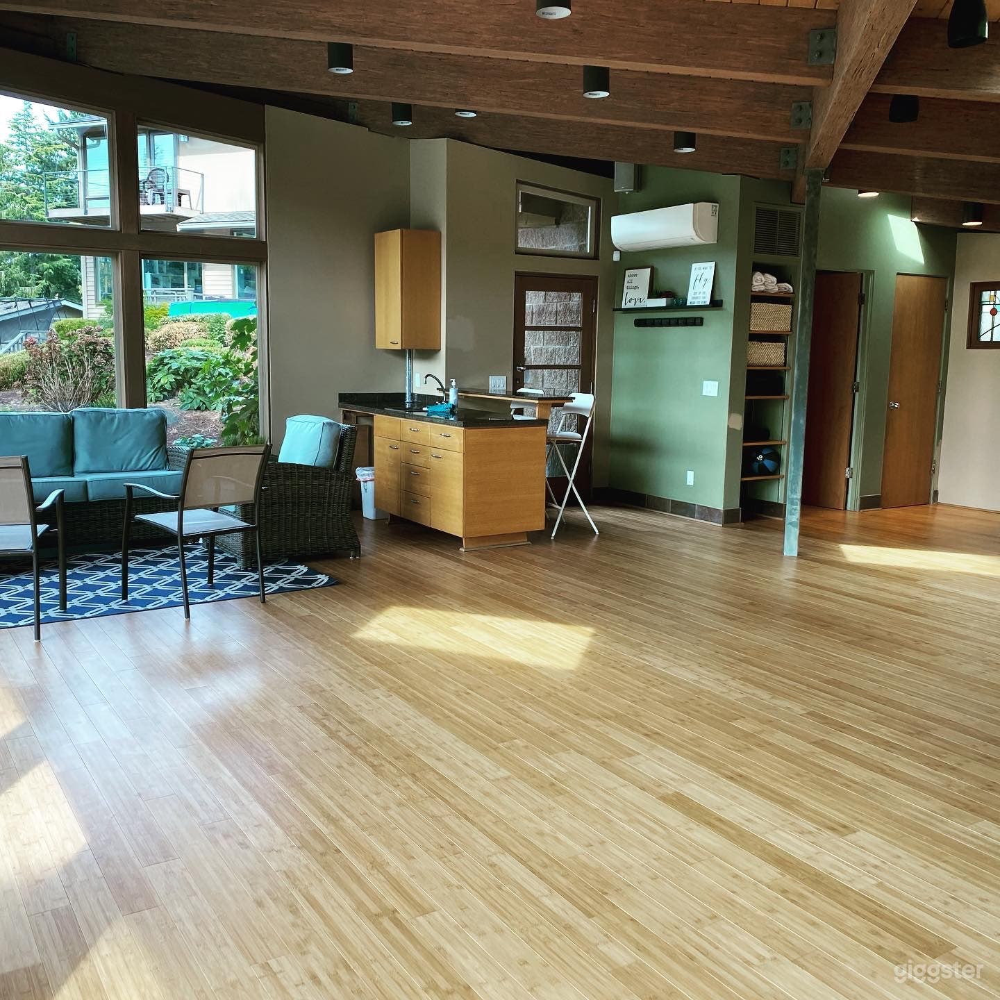 Kitchen area, side entry door, bar seating, cozy sitting area 