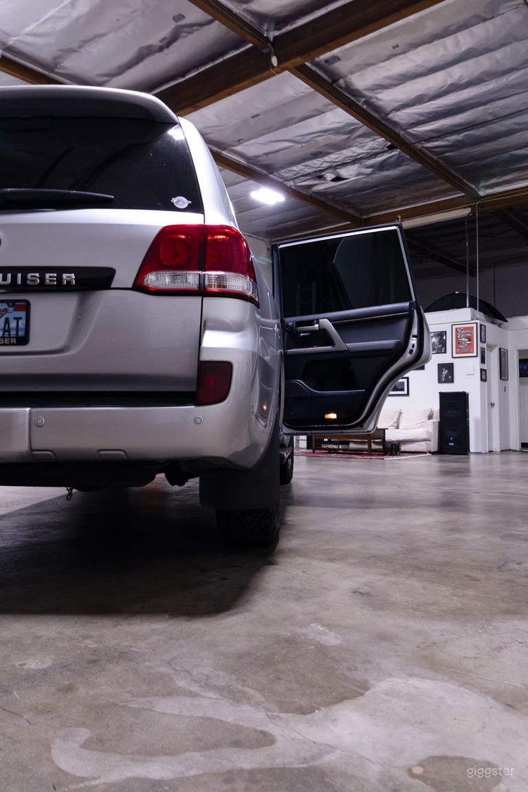  View from back of studio with full-size SUV 