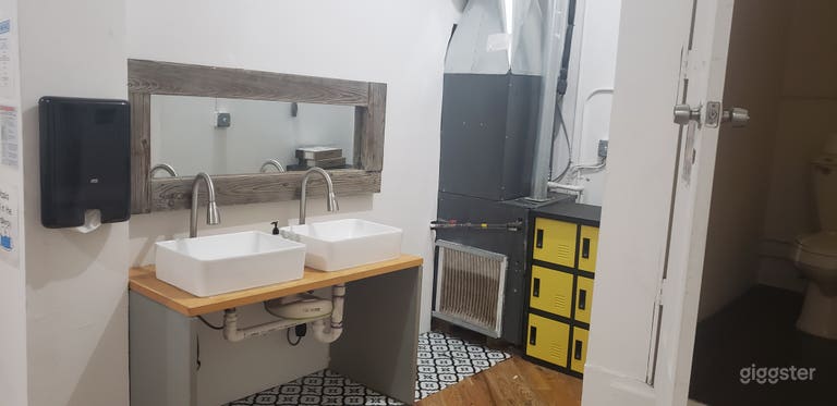  Double sink in front of two person restroom 