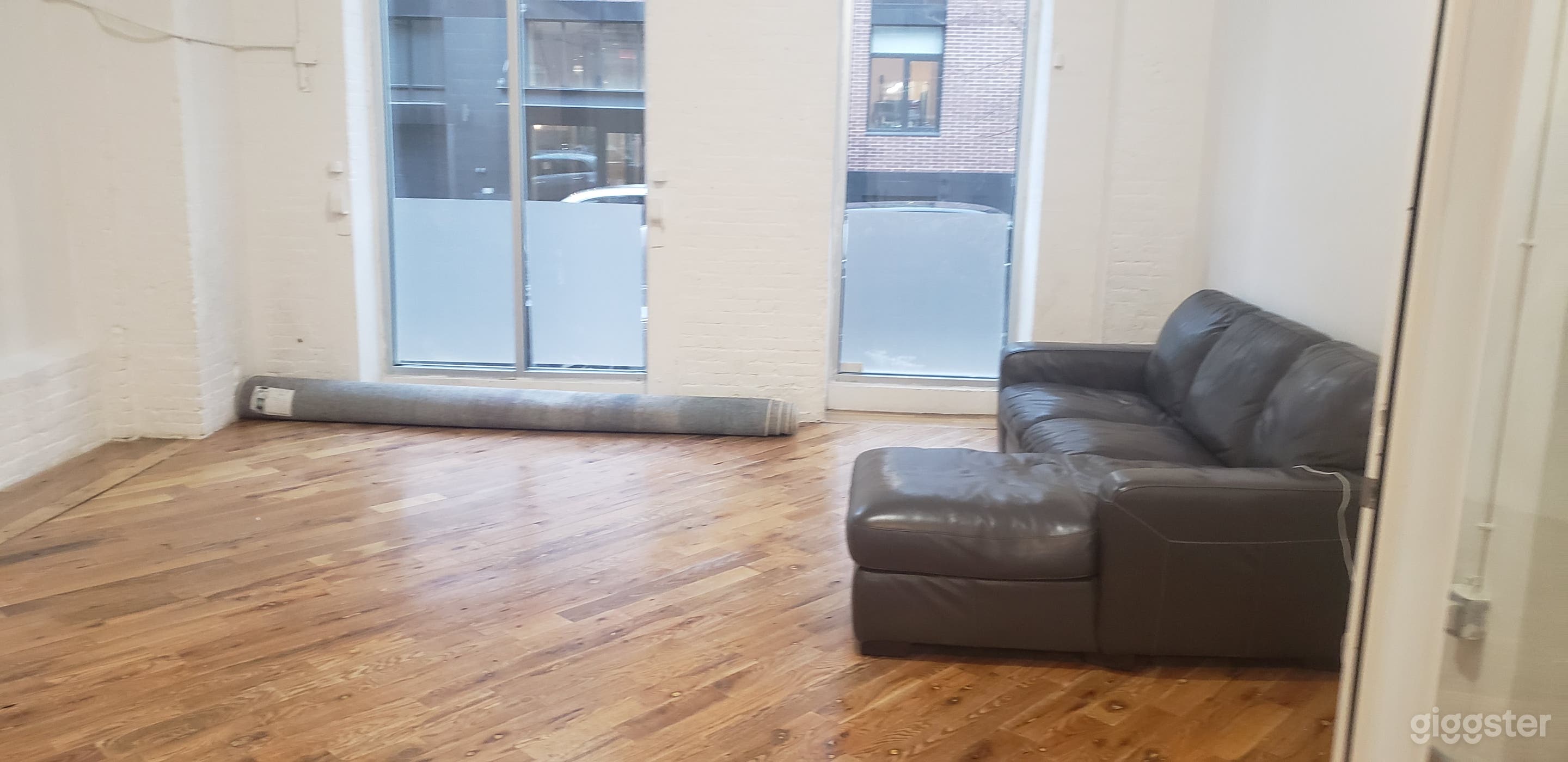 Sitting area with large leather couch
