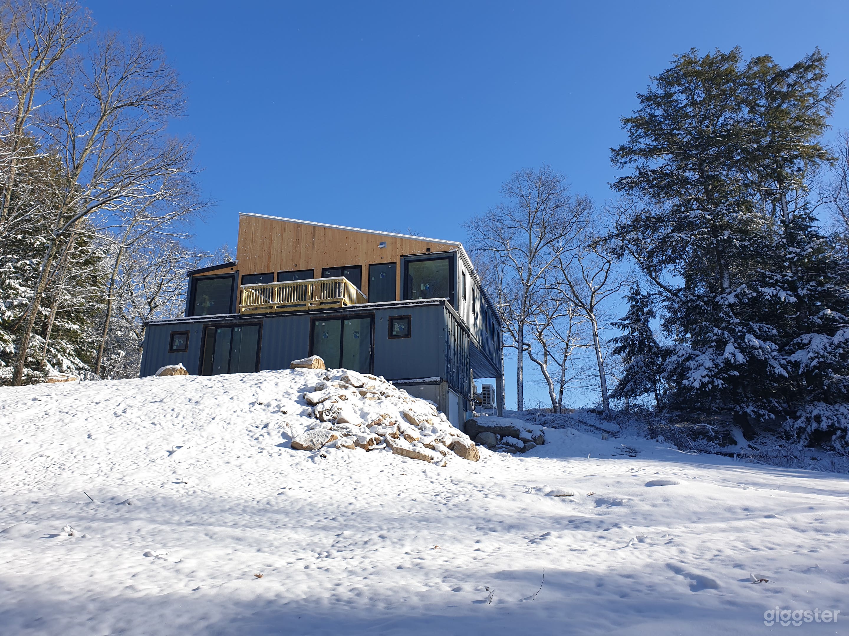 Front deck, entryway, lower in-law suite, and 1/5 of acreage.