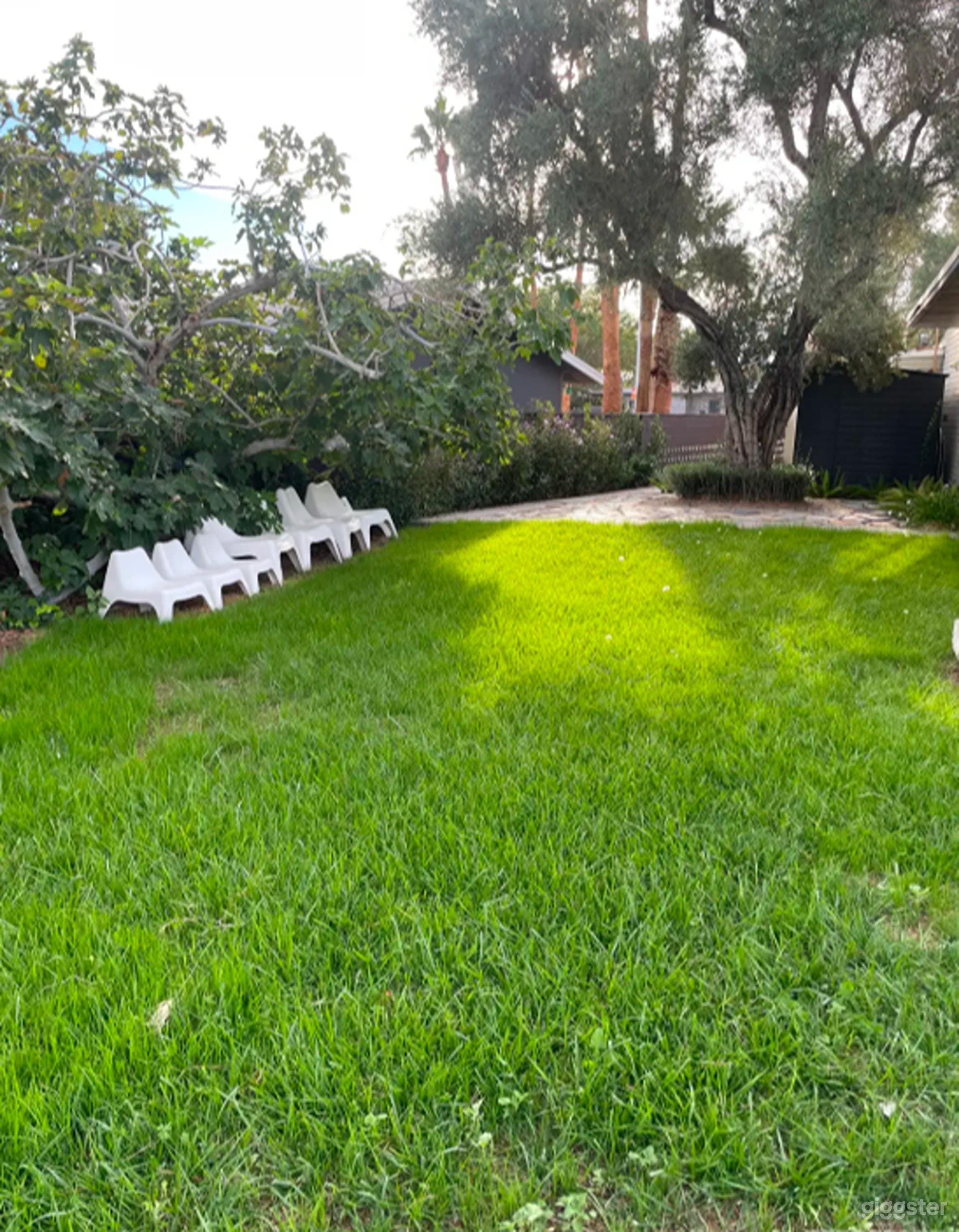 Backyard with Lush Landscaping Photo 1