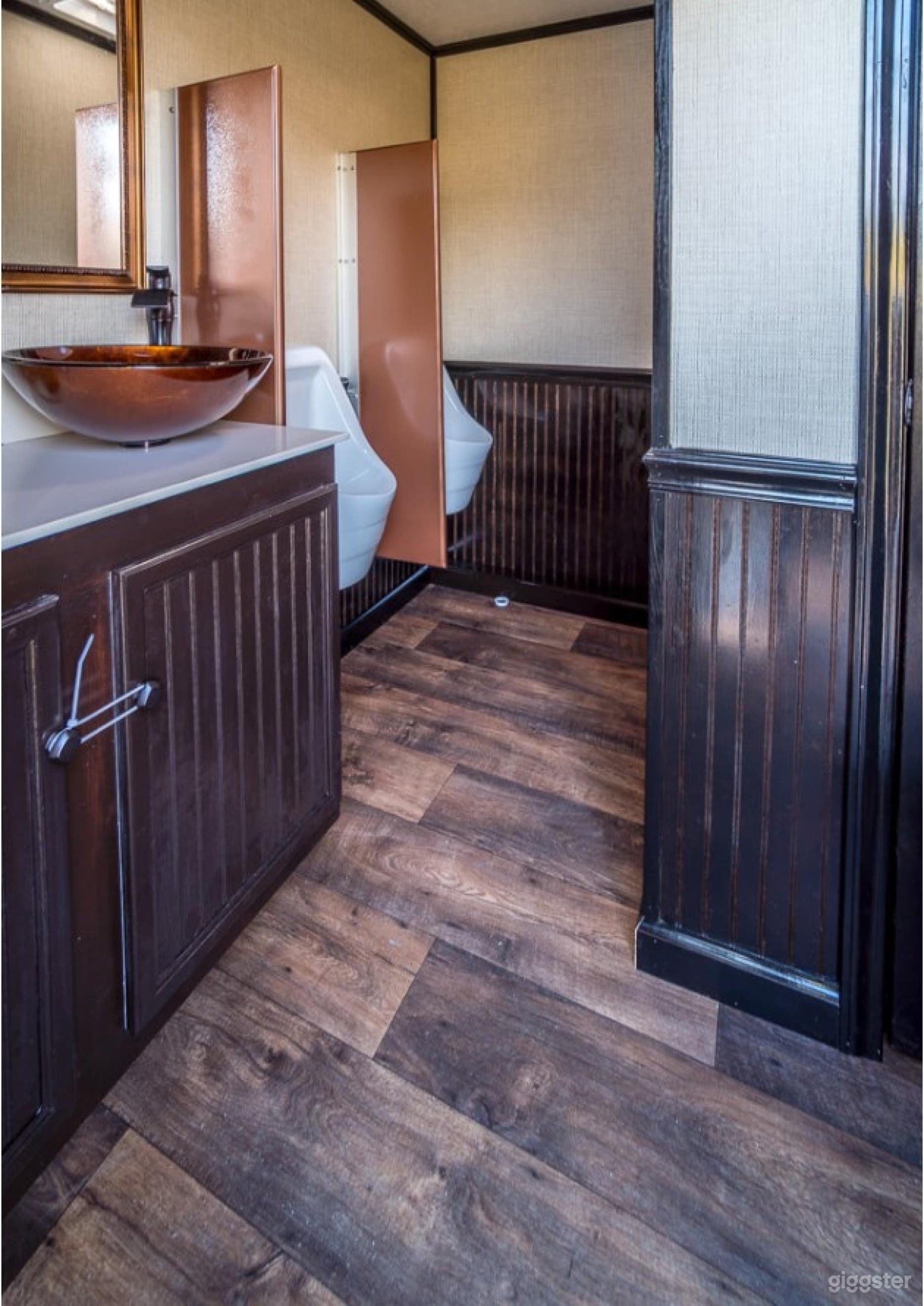 Two urinals, one stall on men's side
