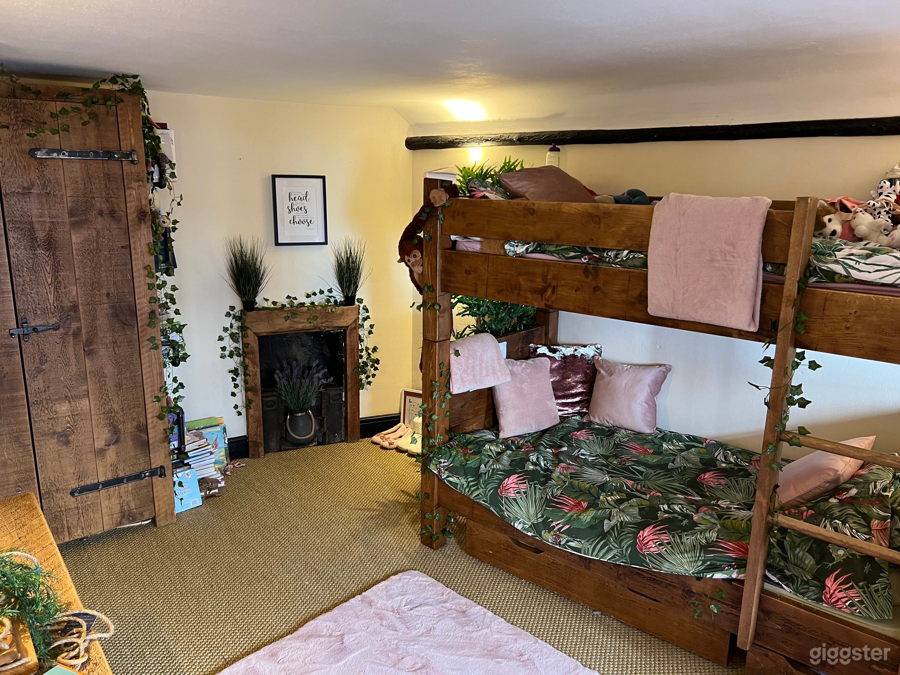 Kids jungle bedroom with feature firplescs and exposed beams 