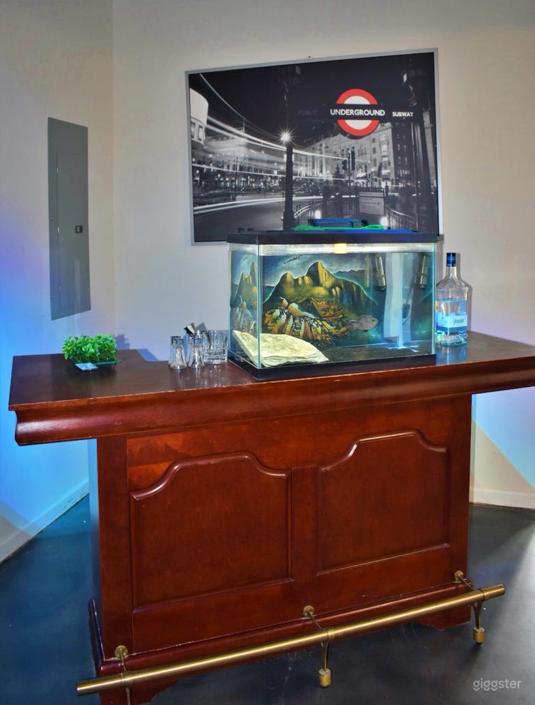  Fully stocked bar with fish tank 