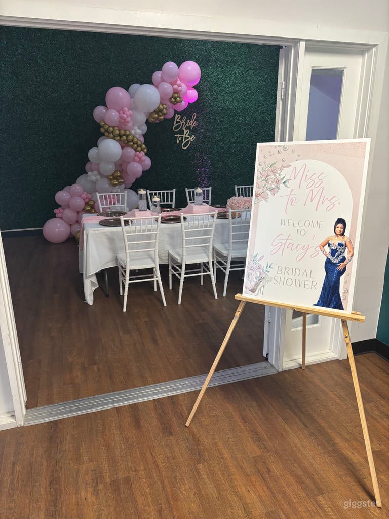  Custom Sign and Pink Uplights with dimmed lights 