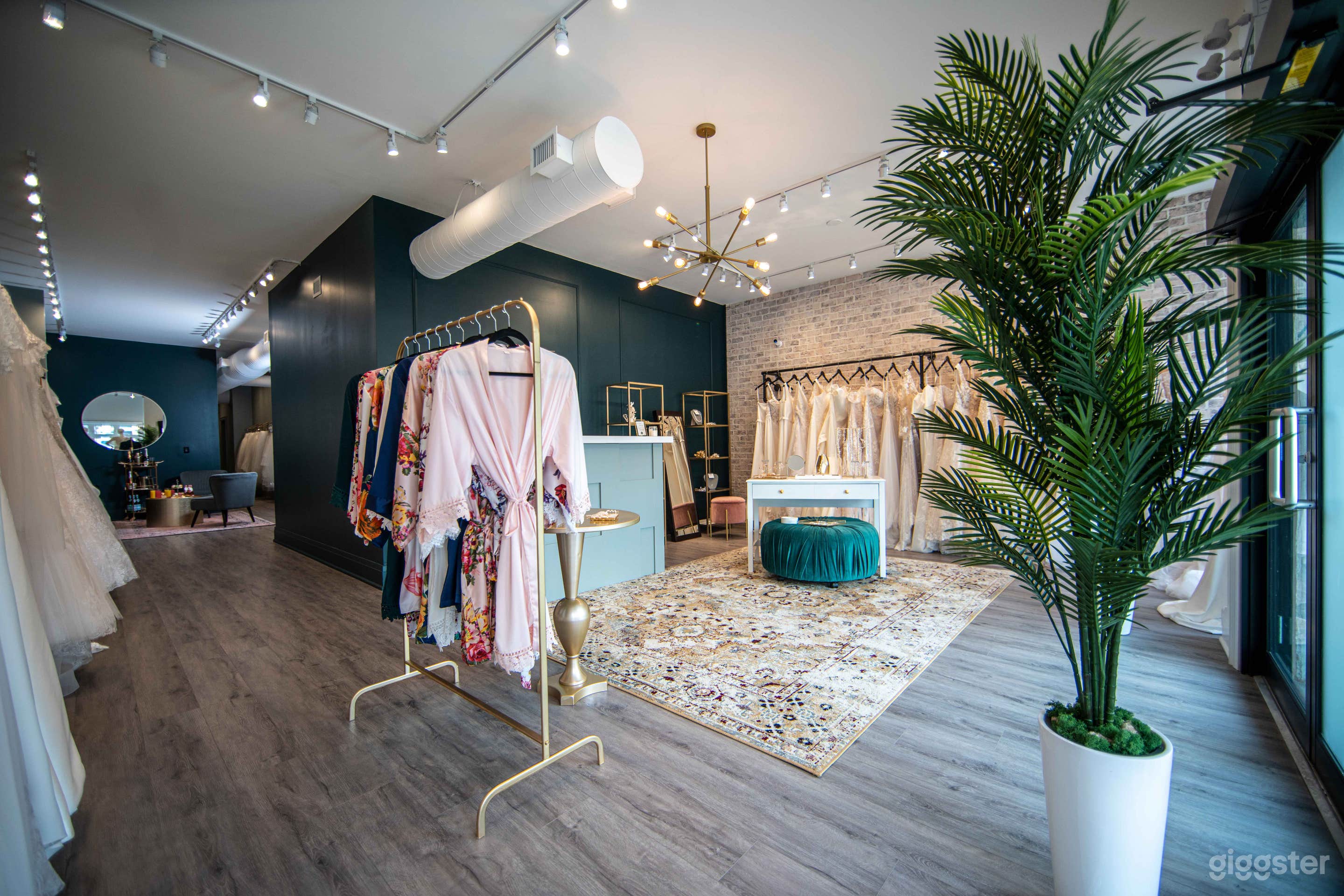 Entryway from street level. Entrance doors located on the right of this photo in front of the tree. There is a branded sign above the desk that had to be excluded from photos.