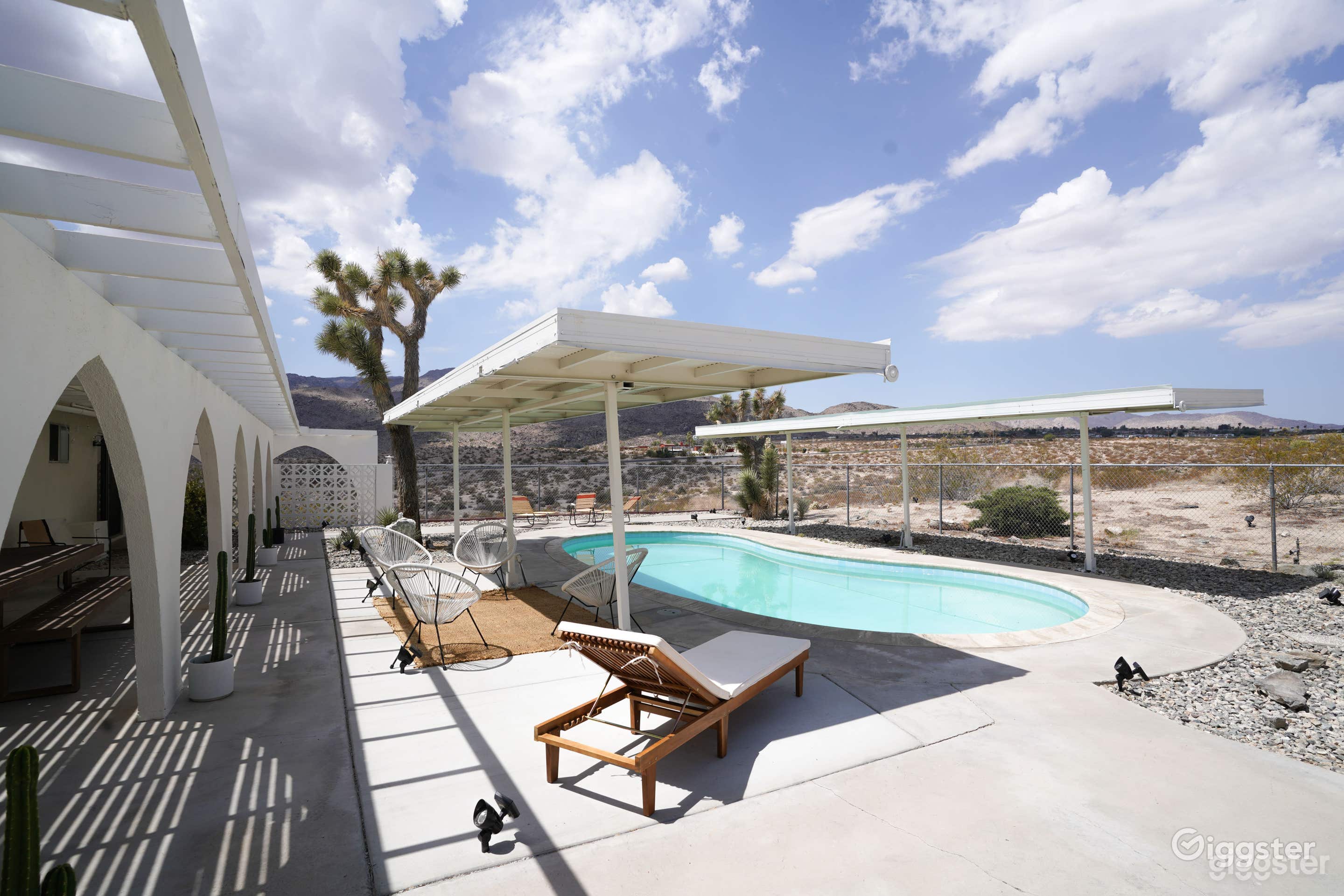Outdoor Pool with Desert and Mountain View Photo 3