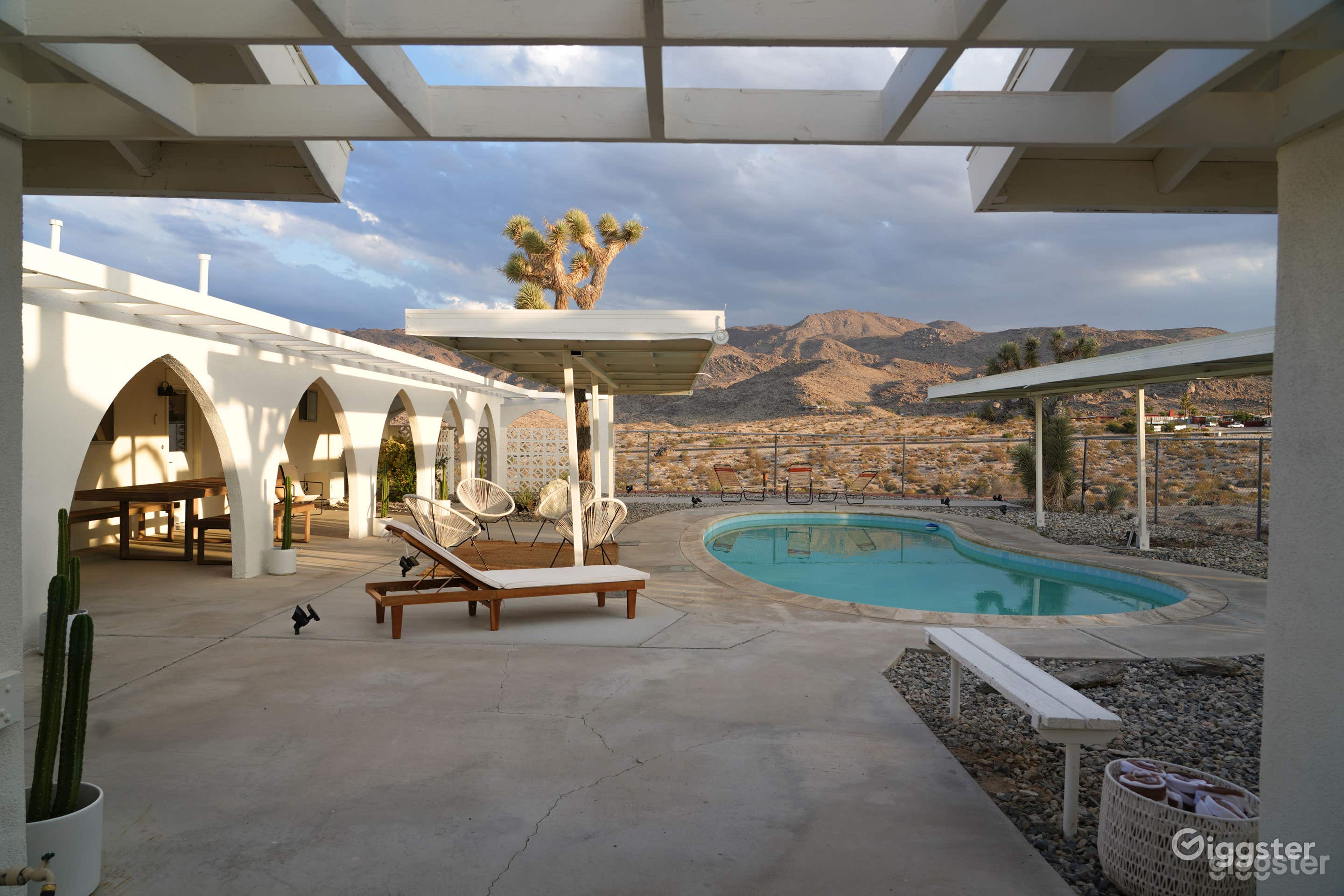 Outdoor Pool with Desert and Mountain View Photo 1