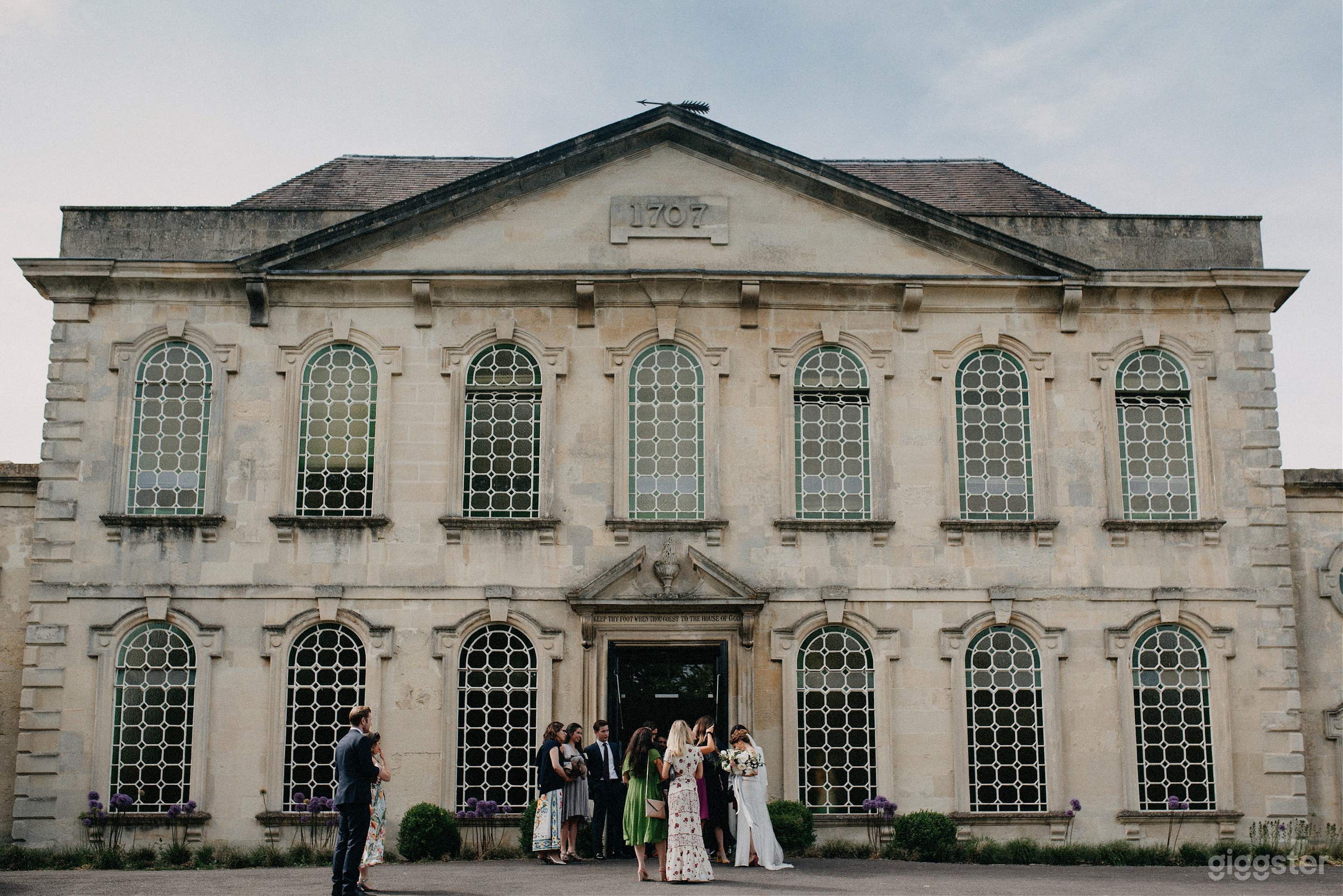 front of building with wedding.