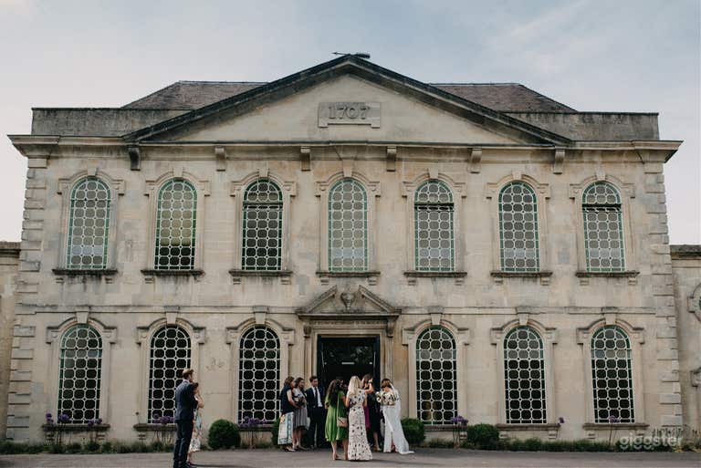  front of building with wedding. 