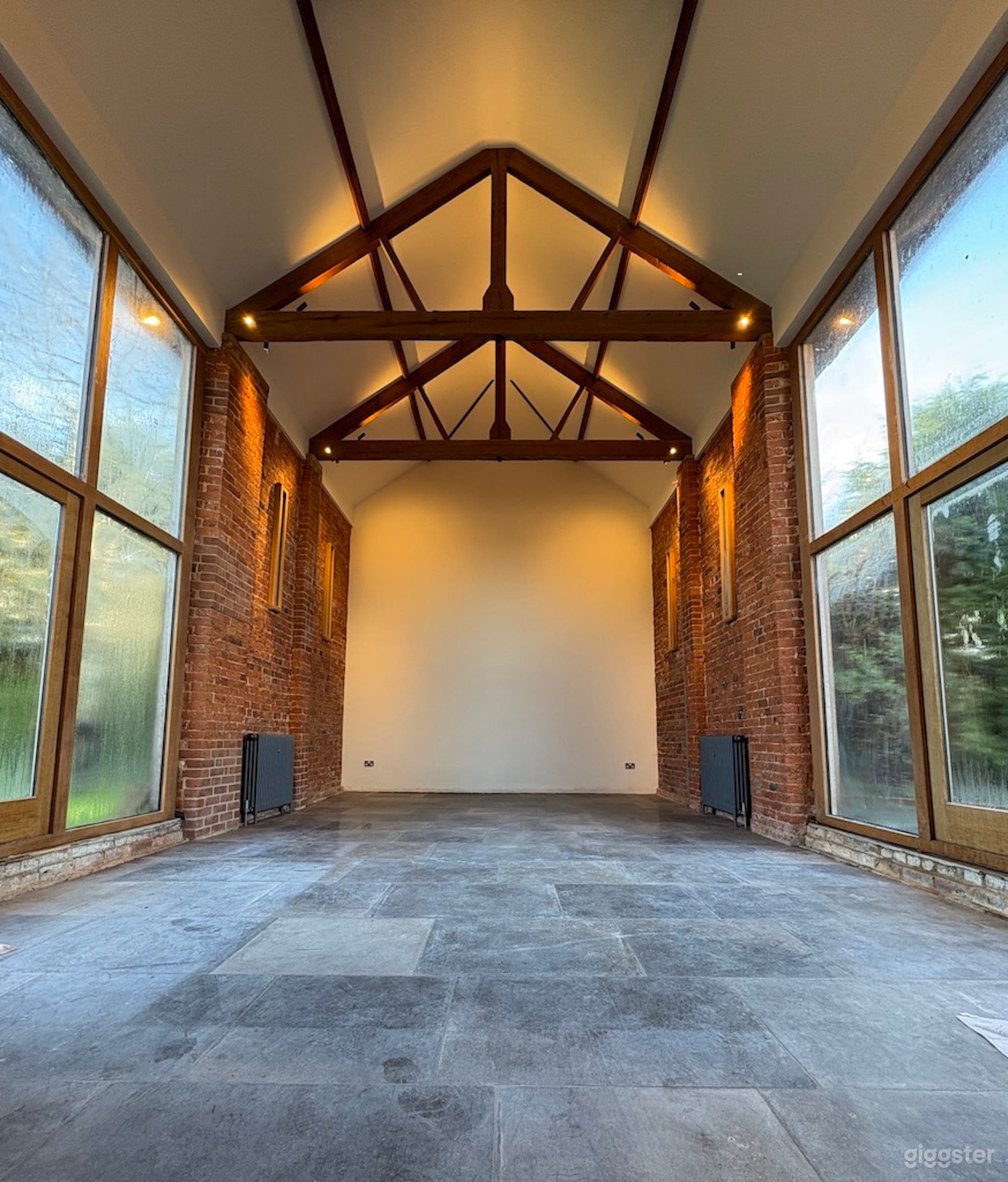 Contemporary barn conversion with floor-to-ceiling windows Photo 1