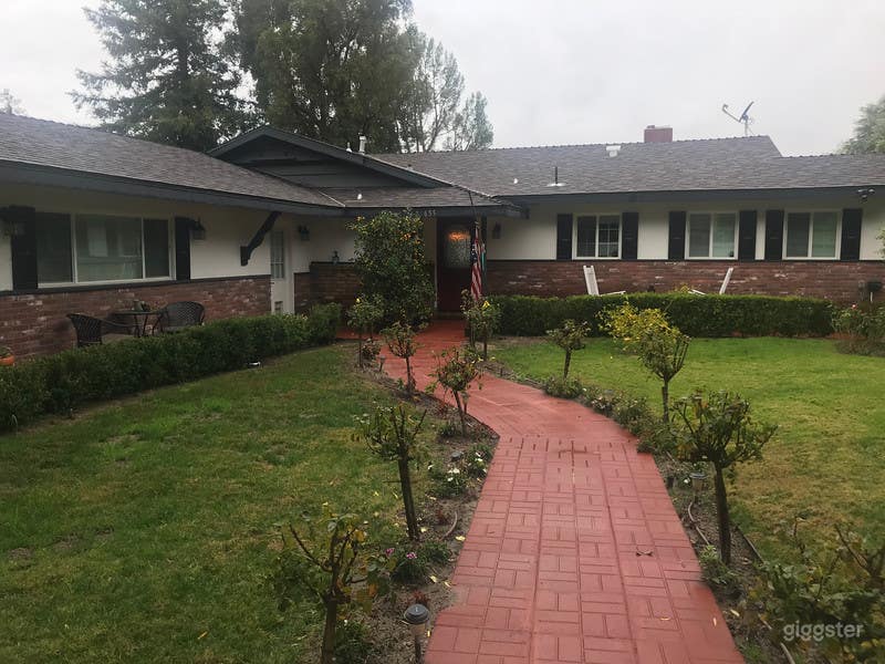 Classic American Ranch sits on 1/2 acre. Large lot with open space. Horse Barn and Large Pool.
