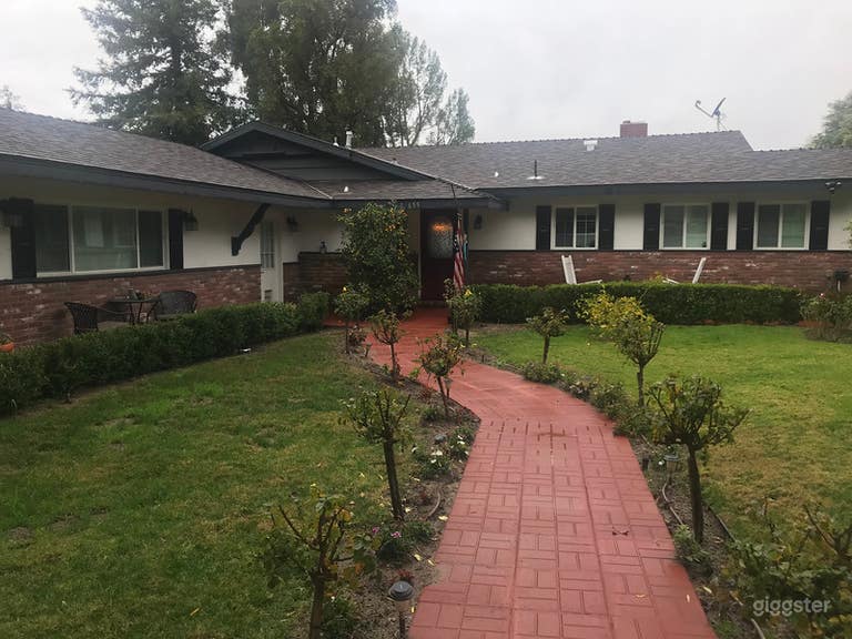  Classic American Ranch sits on 1/2 acre. Large lot with open space. Horse Barn and Large Pool.
 